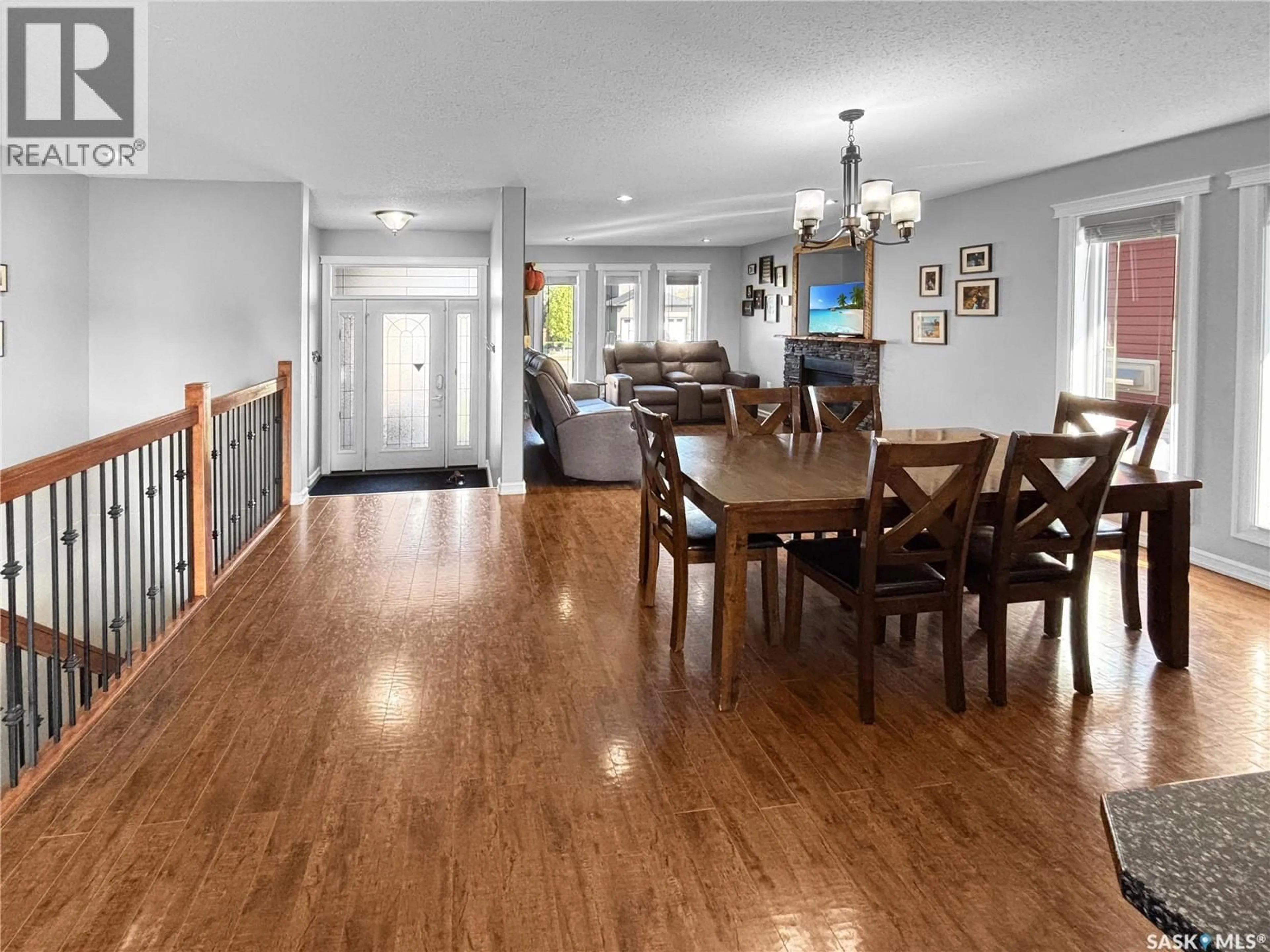 Dining room, wood/laminate floor for 10320 MAHER DRIVE, North Battleford Saskatchewan S9A0J1