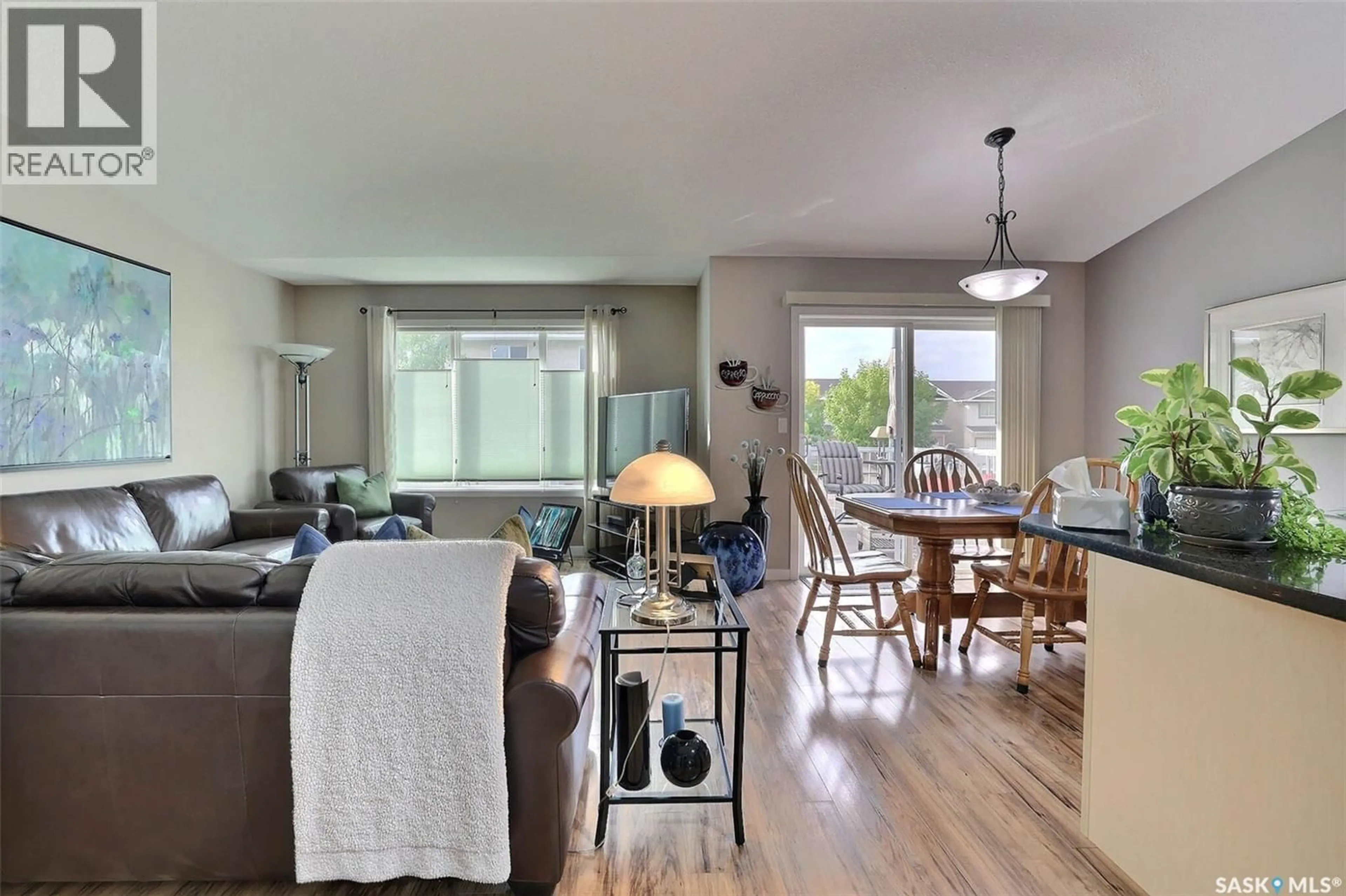 Living room with furniture, wood/laminate floor for 4101 - 42 PRESTON CRESCENT, Regina Saskatchewan S4X0G3