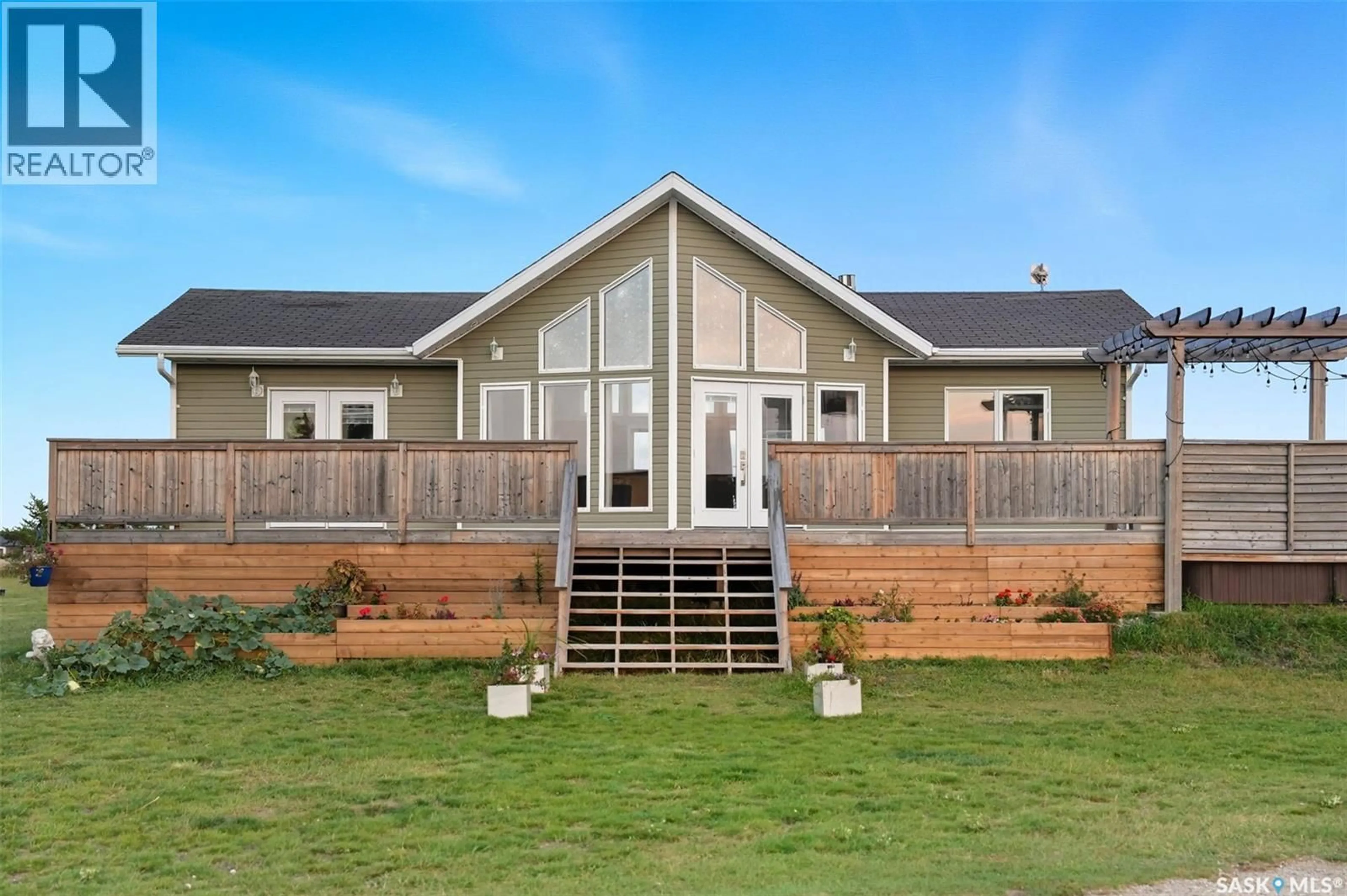 A pic from outside/outdoor area/front of a property/back of a property/a pic from drone, mountain view for CHENIER ACREAGE, Vanscoy Rm No. 345 Saskatchewan S0K0J0