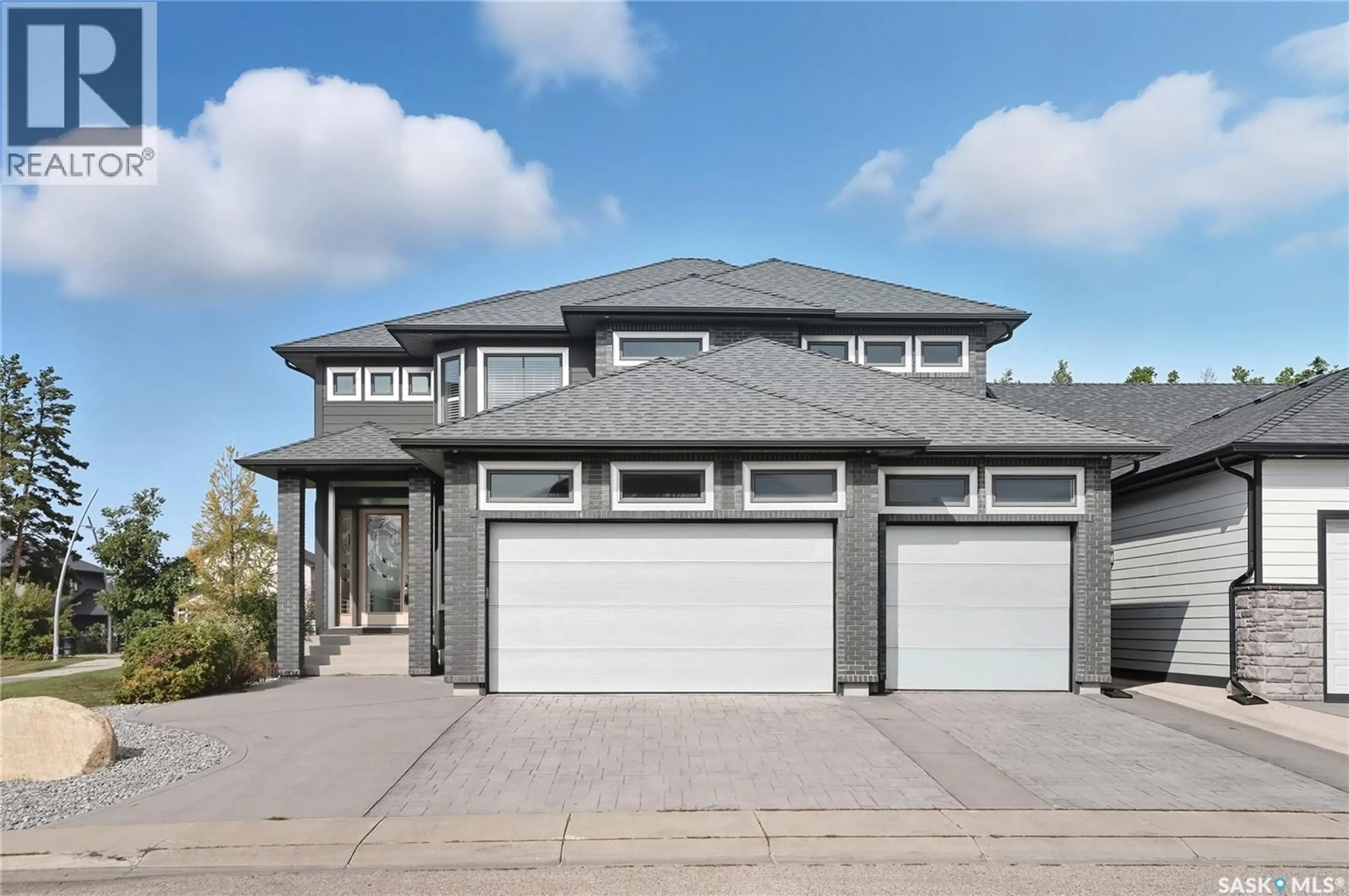 Home with vinyl exterior material, street for 559 ATTON LANE, Saskatoon Saskatchewan S7W0K6