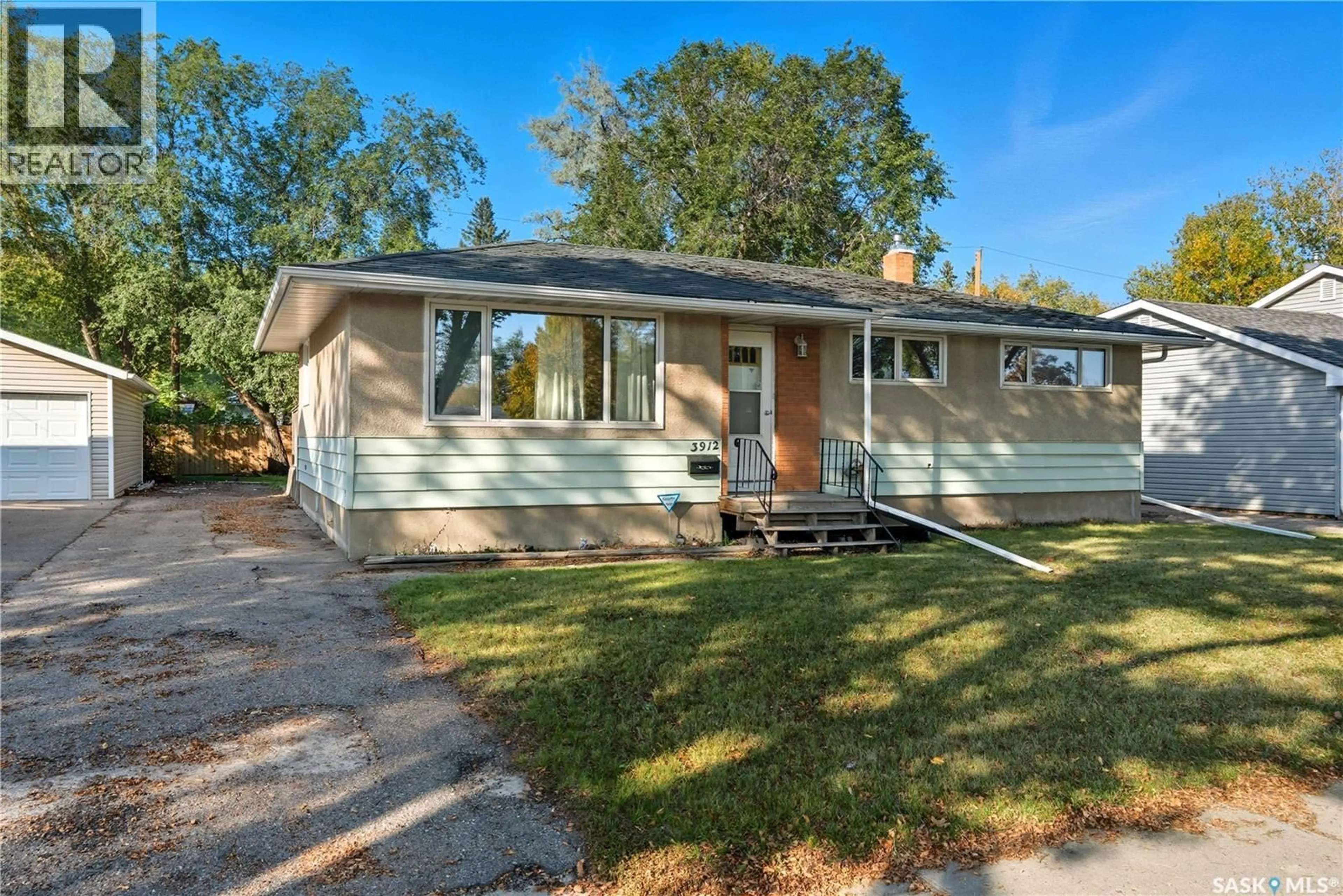 Home with vinyl exterior material, street for 3912 SHERWOOD DRIVE, Regina Saskatchewan S4R4A6