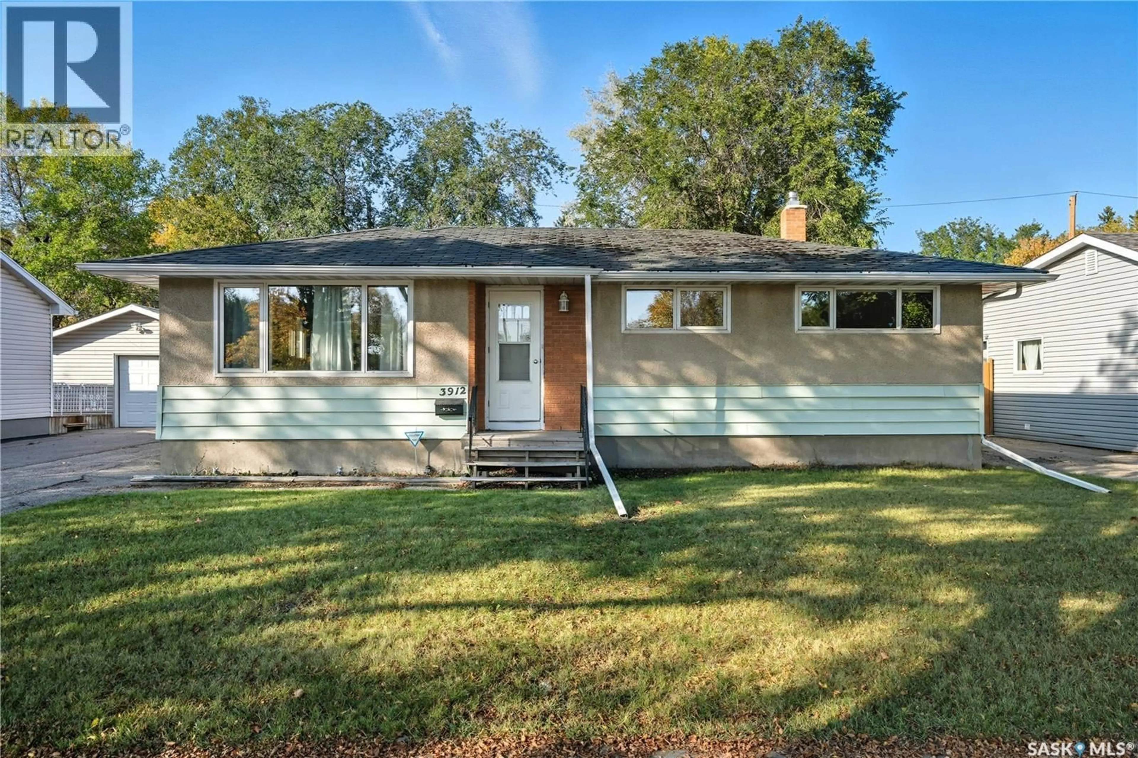 Home with vinyl exterior material, street for 3912 SHERWOOD DRIVE, Regina Saskatchewan S4R4A6