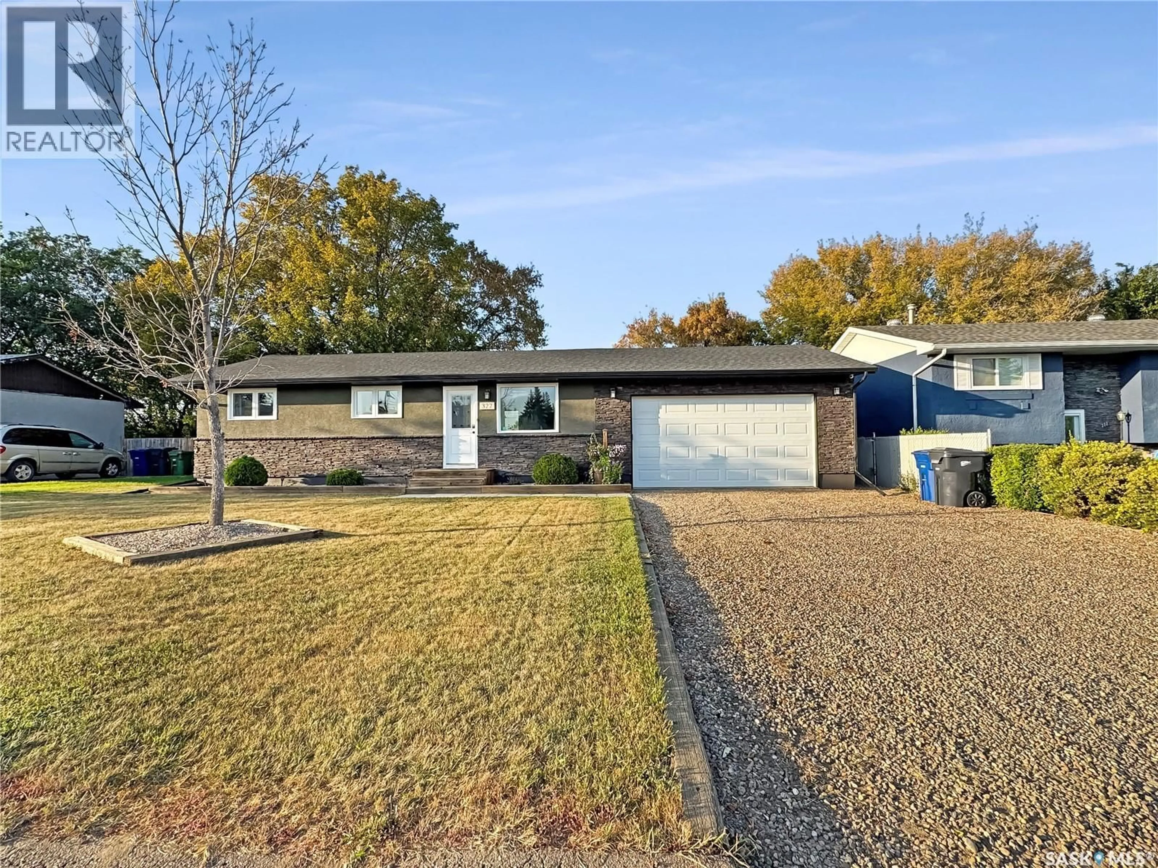 Home with vinyl exterior material, street for 322 33RD STREET, Battleford Saskatchewan S0M0E0