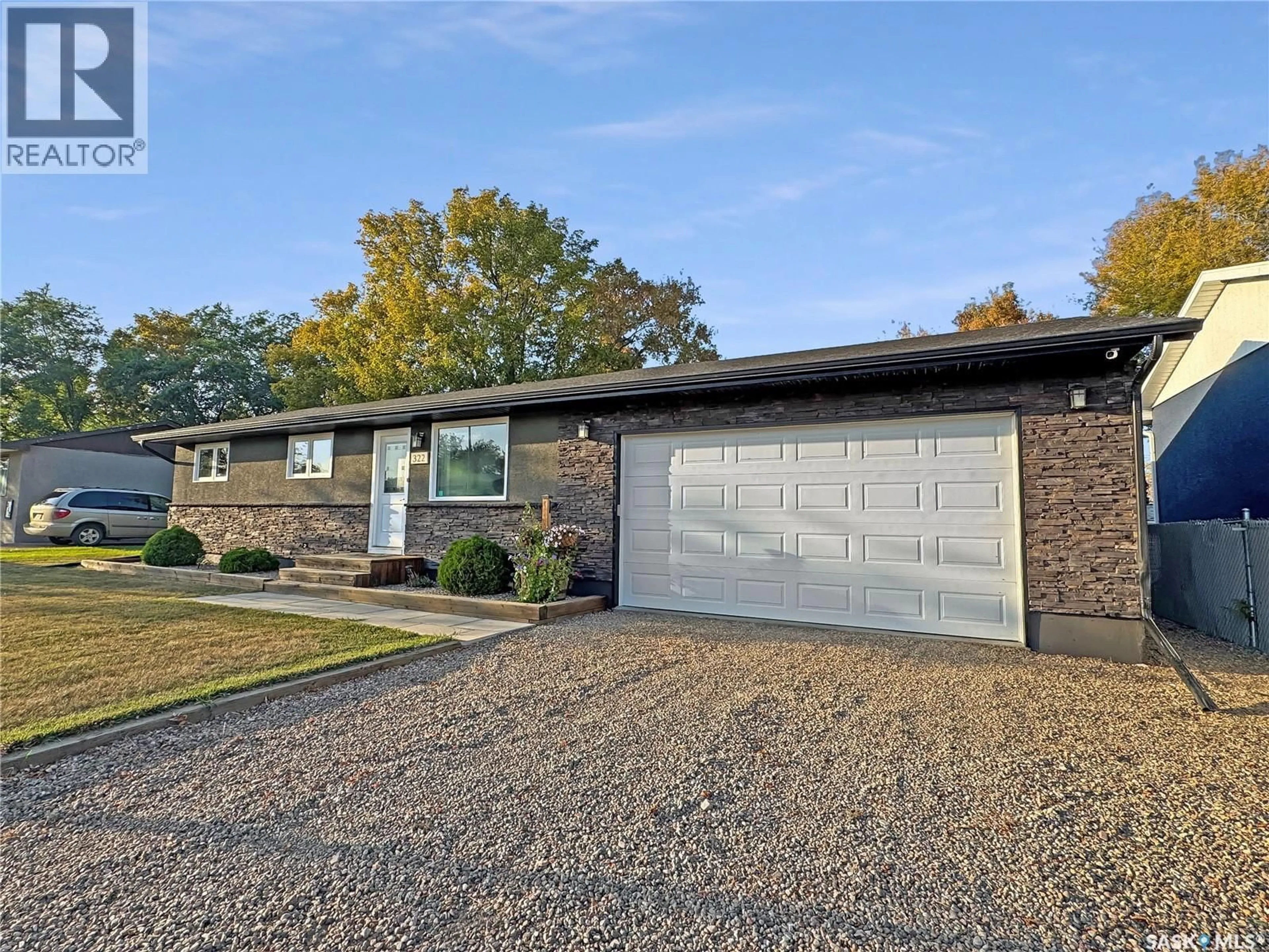 Home with vinyl exterior material, street for 322 33RD STREET, Battleford Saskatchewan S0M0E0