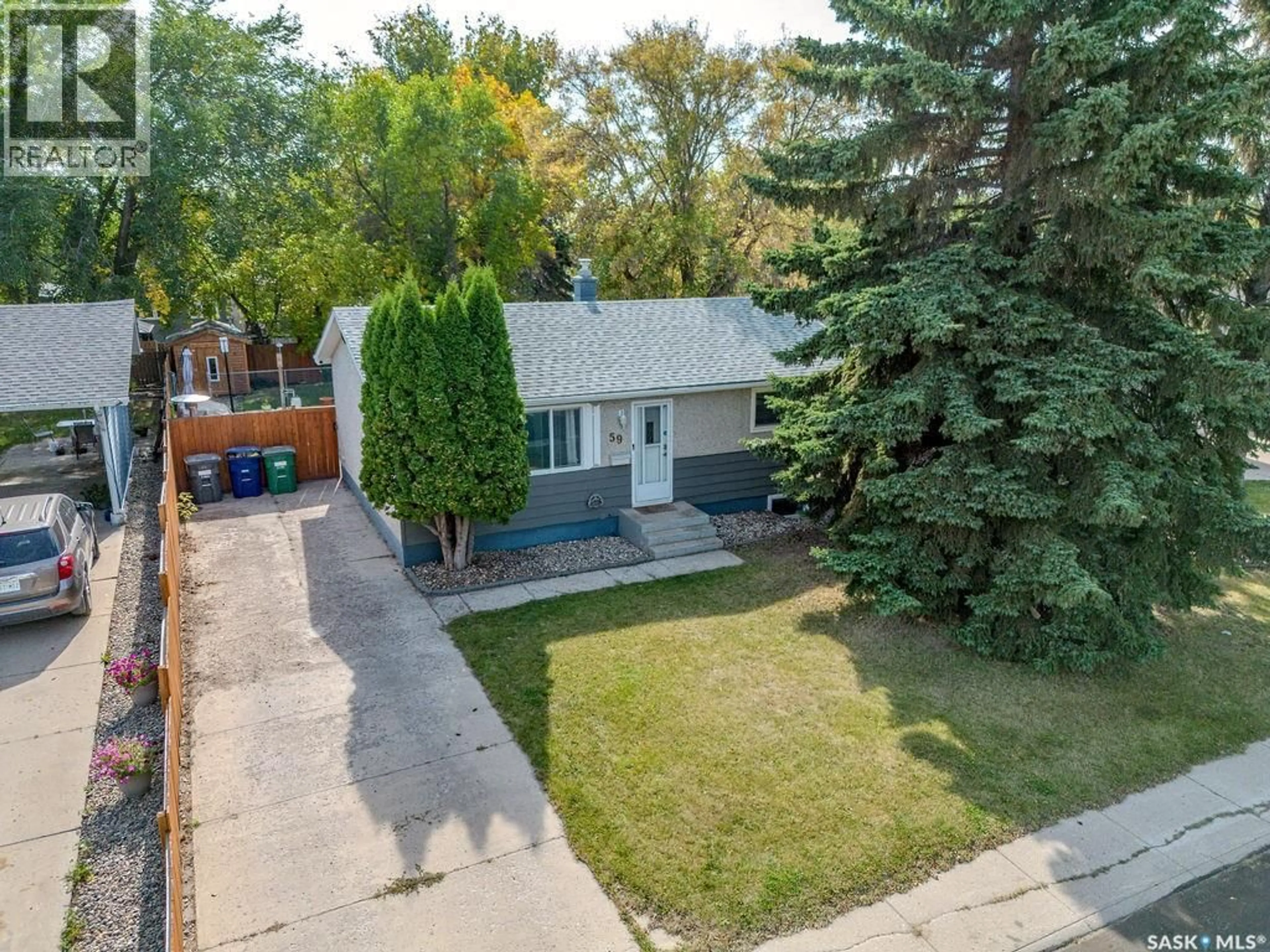 A pic from outside/outdoor area/front of a property/back of a property/a pic from drone, street for 59 WENTWORTH CRESCENT, Saskatoon Saskatchewan S7L4A8