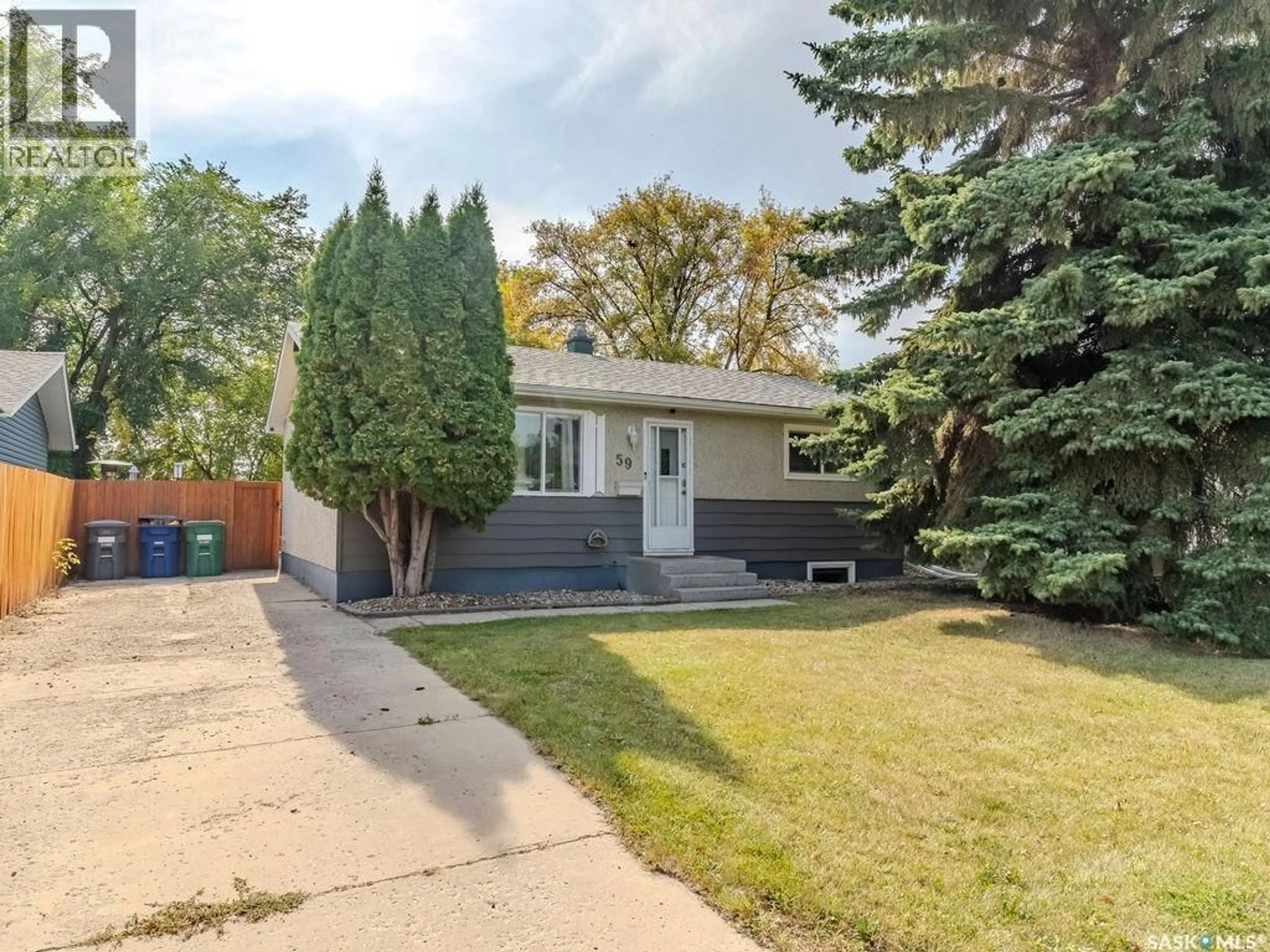 Home with vinyl exterior material, street for 59 WENTWORTH CRESCENT, Saskatoon Saskatchewan S7L4A8
