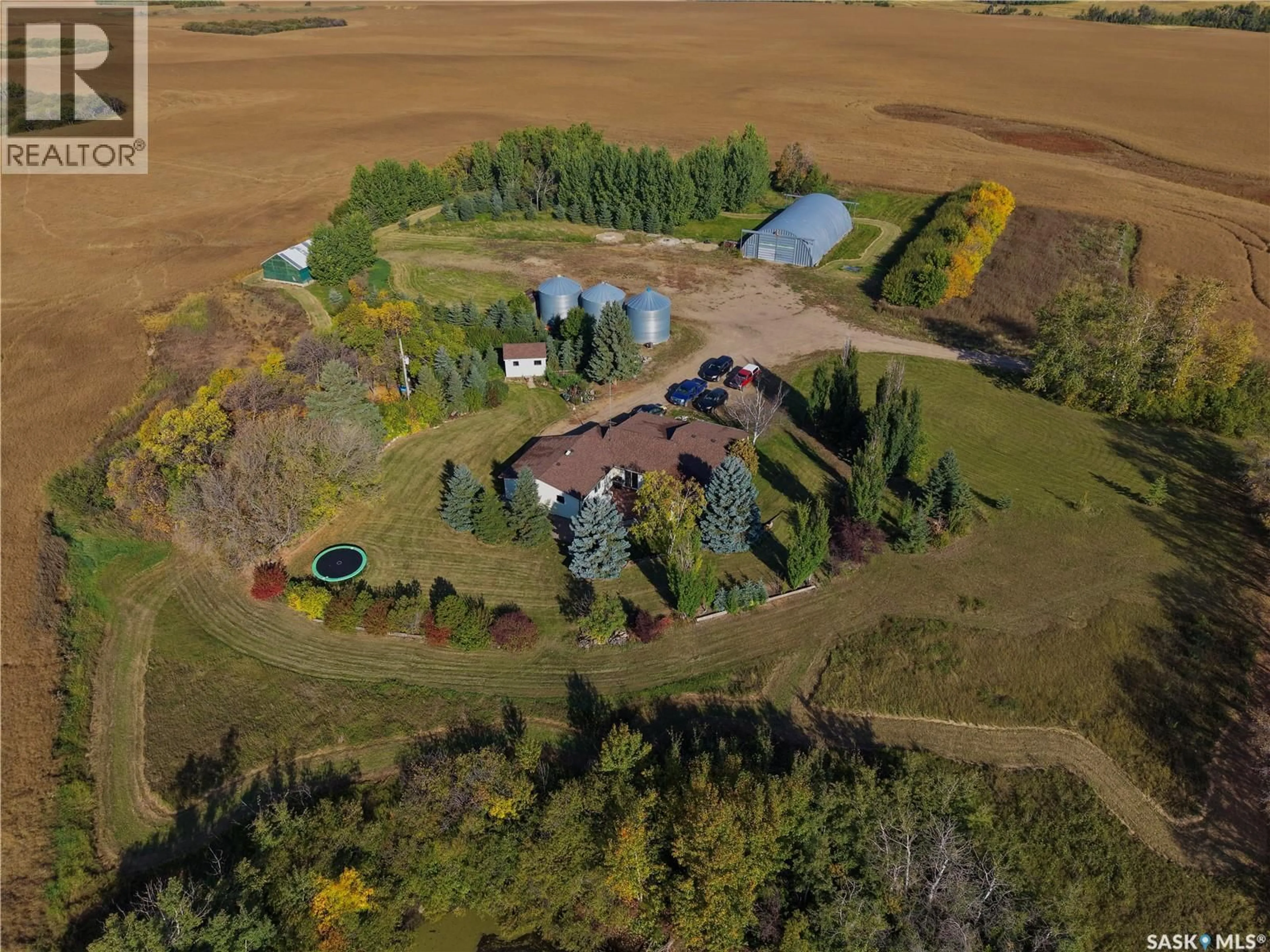 A pic from outside/outdoor area/front of a property/back of a property/a pic from drone, unknown for FOREST HALL ACREAGE, North Battleford Rm No. 437 Saskatchewan S9A2Y1