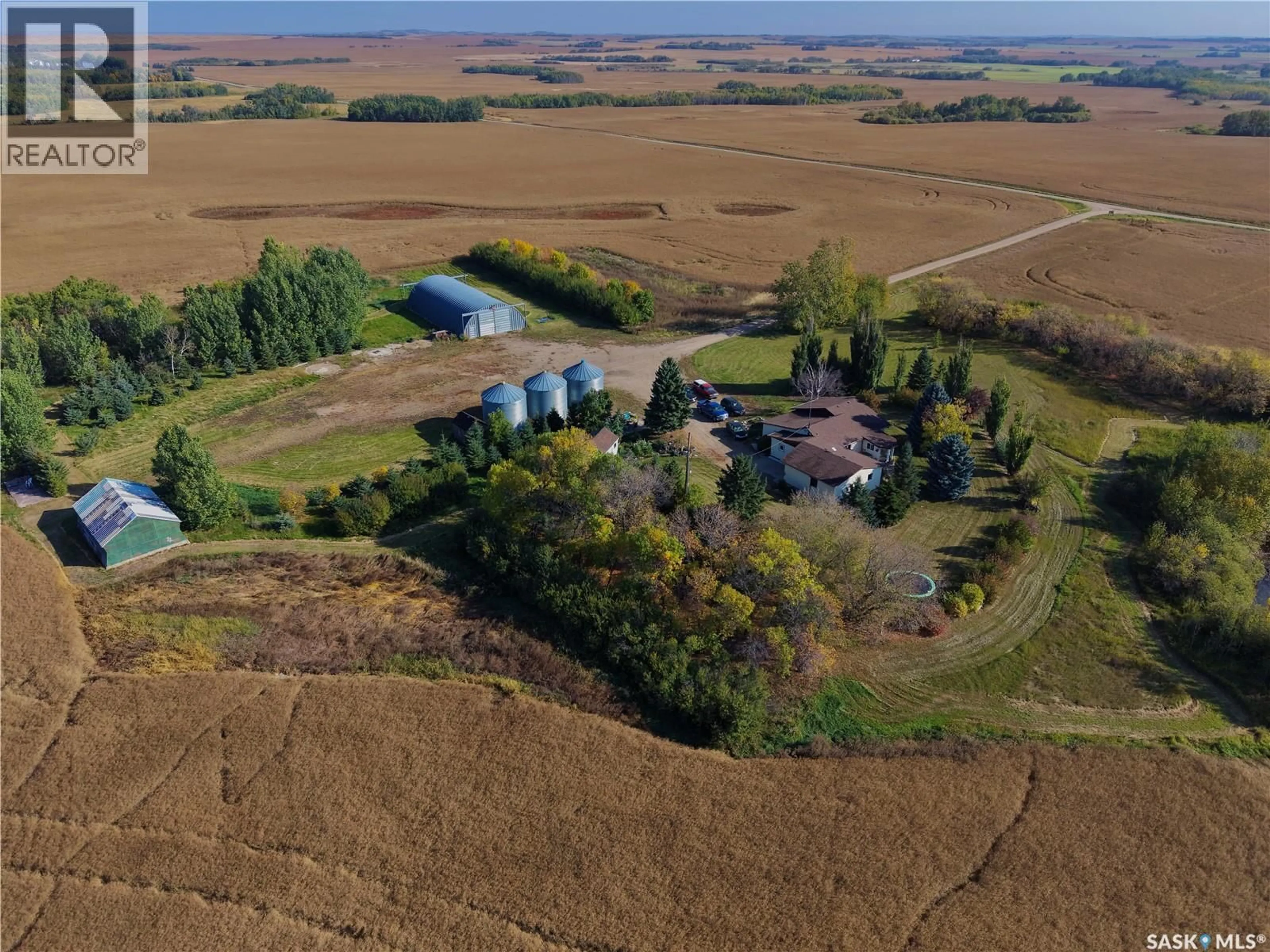 A pic from outside/outdoor area/front of a property/back of a property/a pic from drone, unknown for FOREST HALL ACREAGE, North Battleford Rm No. 437 Saskatchewan S9A2Y1