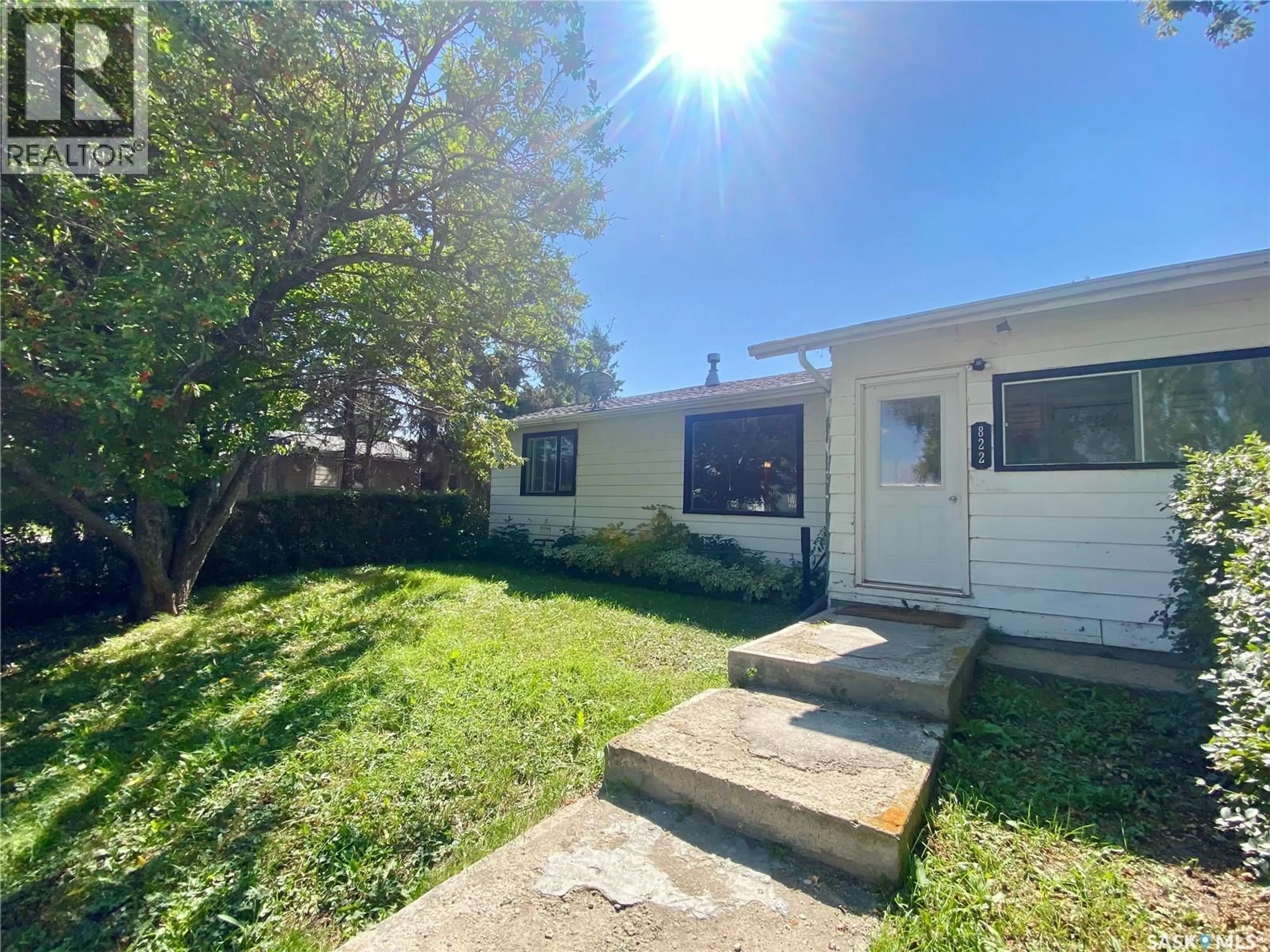 A pic from outside/outdoor area/front of a property/back of a property/a pic from drone, street for 822 4TH AVENUE, Raymore Saskatchewan S0A3J0