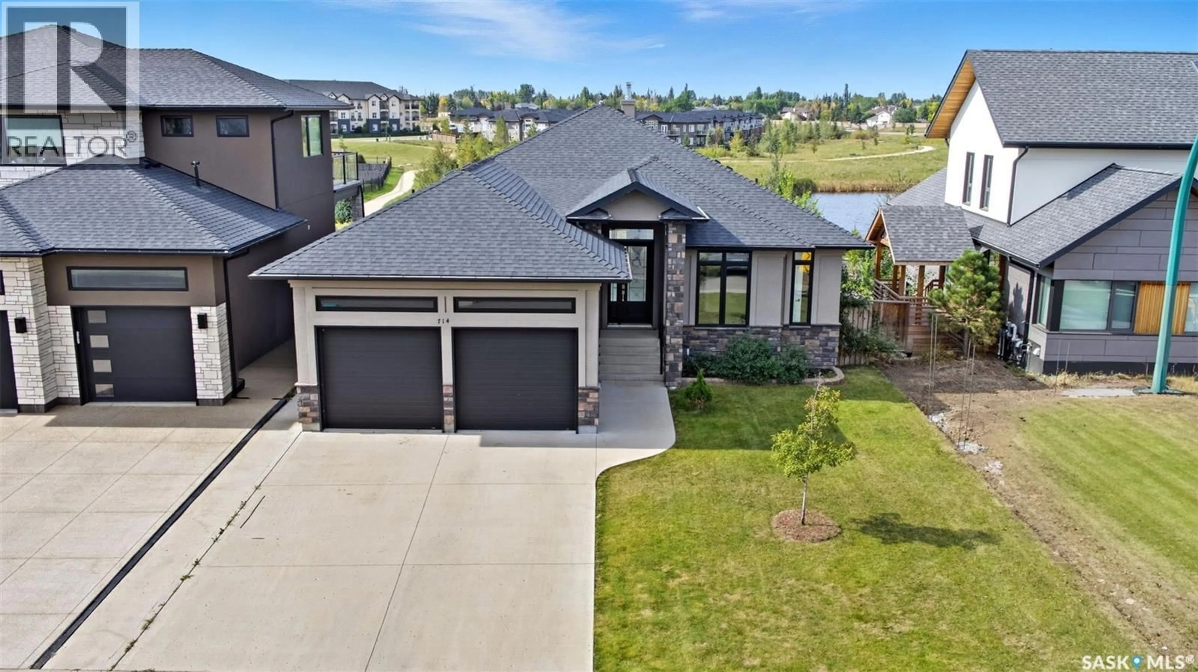 A pic from outside/outdoor area/front of a property/back of a property/a pic from drone, street for 714 LEDINGHAM PLACE, Saskatoon Saskatchewan S7V0B6