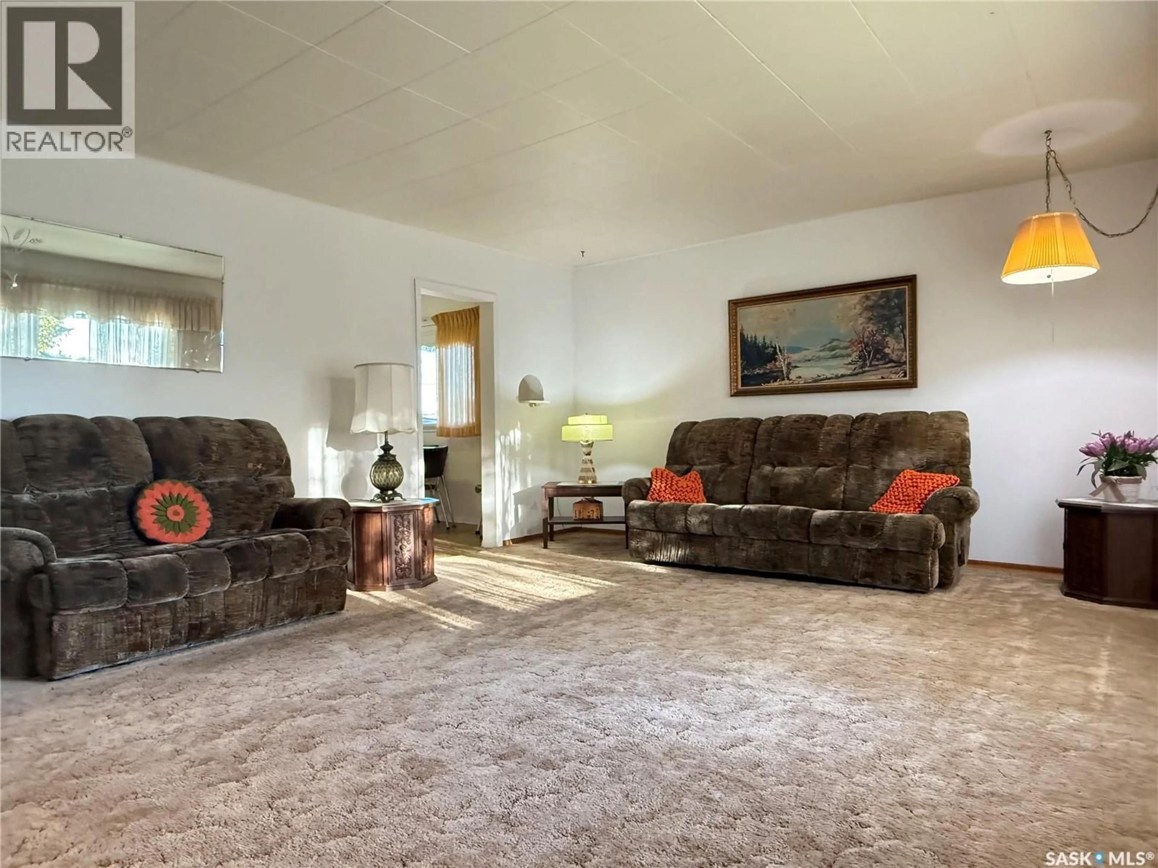 Living room with furniture, carpet floor for 745 SCOTIA STREET, Melville Saskatchewan S0A2P0