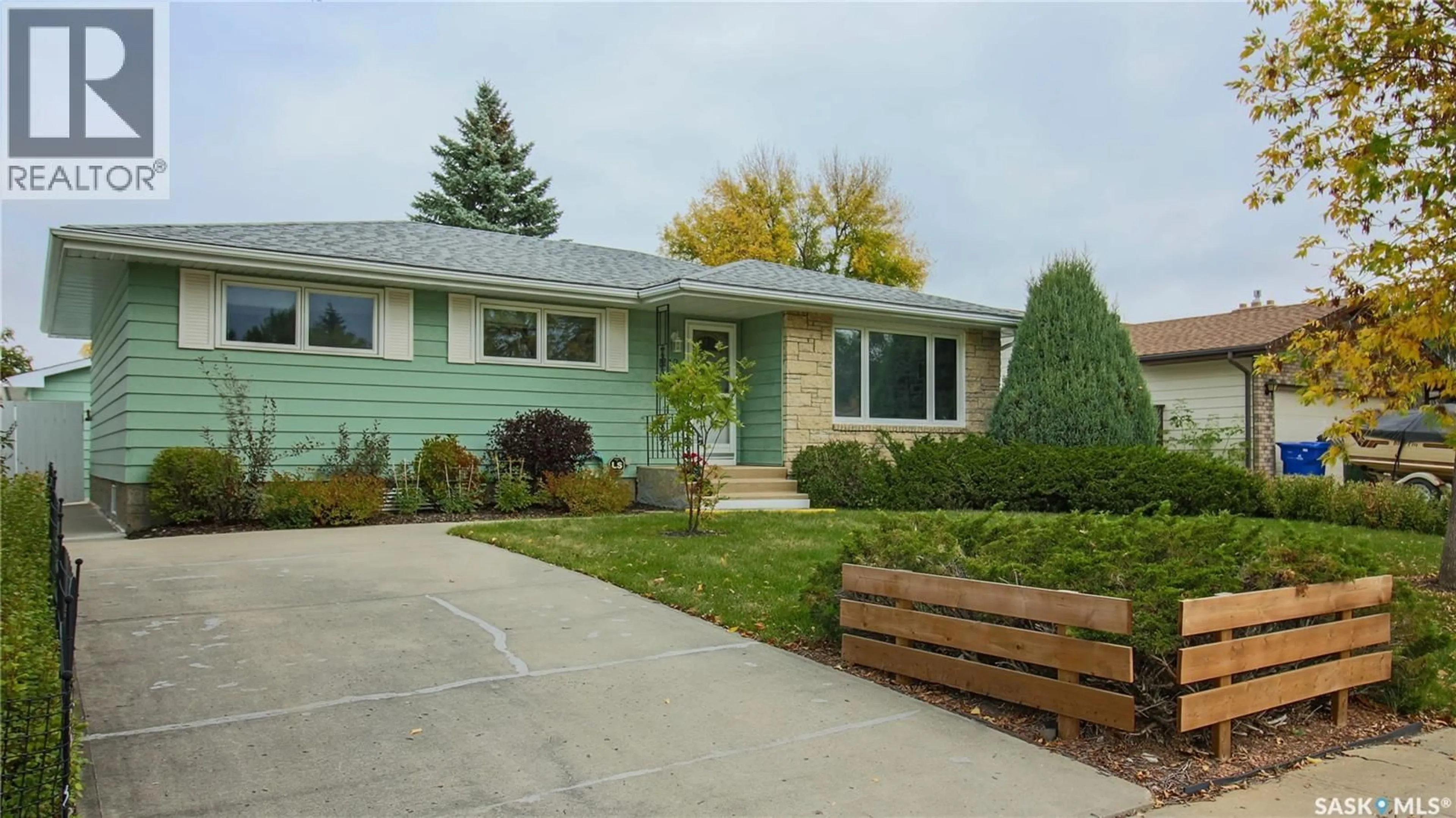 Home with vinyl exterior material, street for 42 HAWKES AVENUE, Regina Saskatchewan S4X1B4