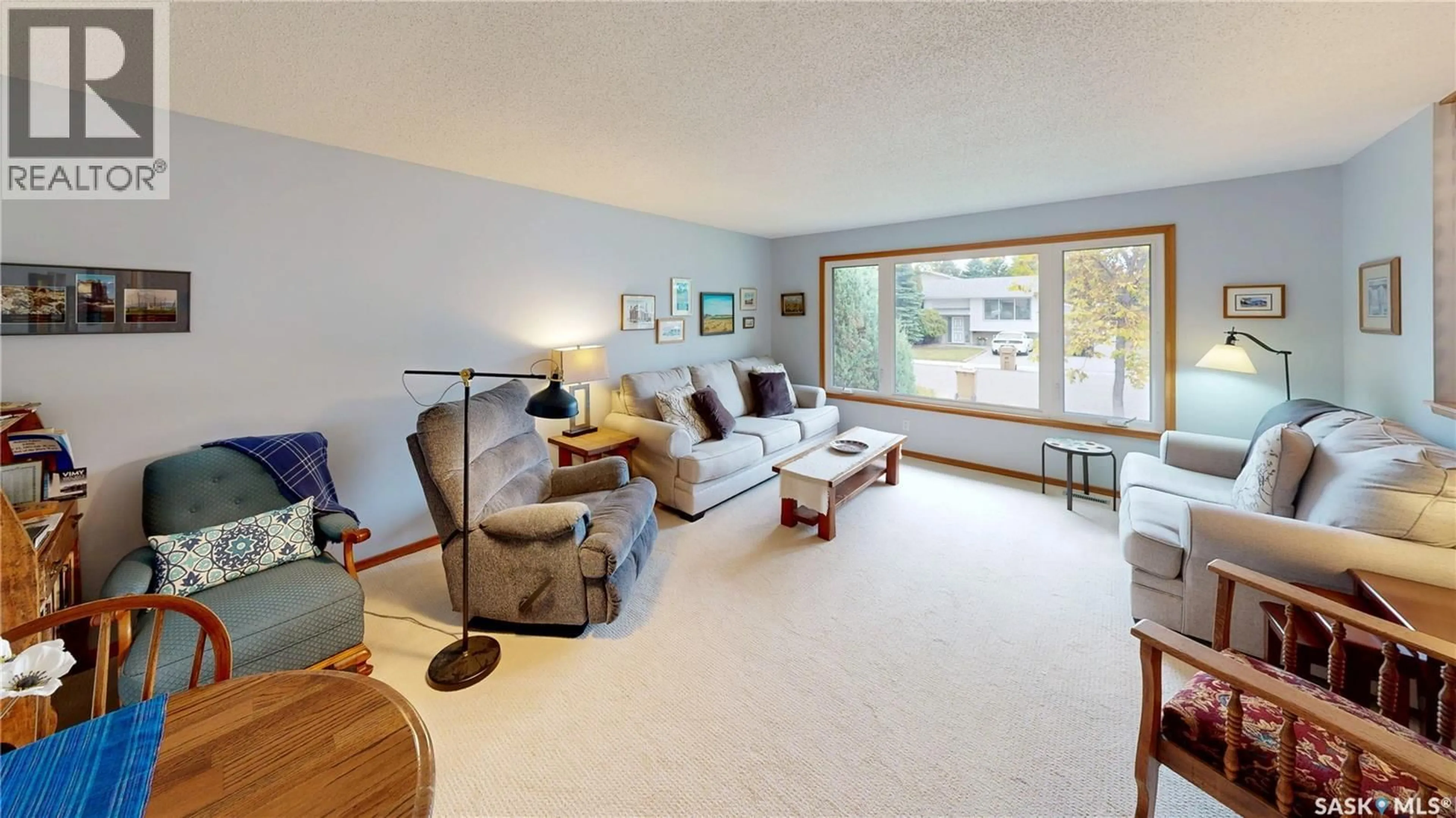 Living room with furniture, unknown for 42 HAWKES AVENUE, Regina Saskatchewan S4X1B4