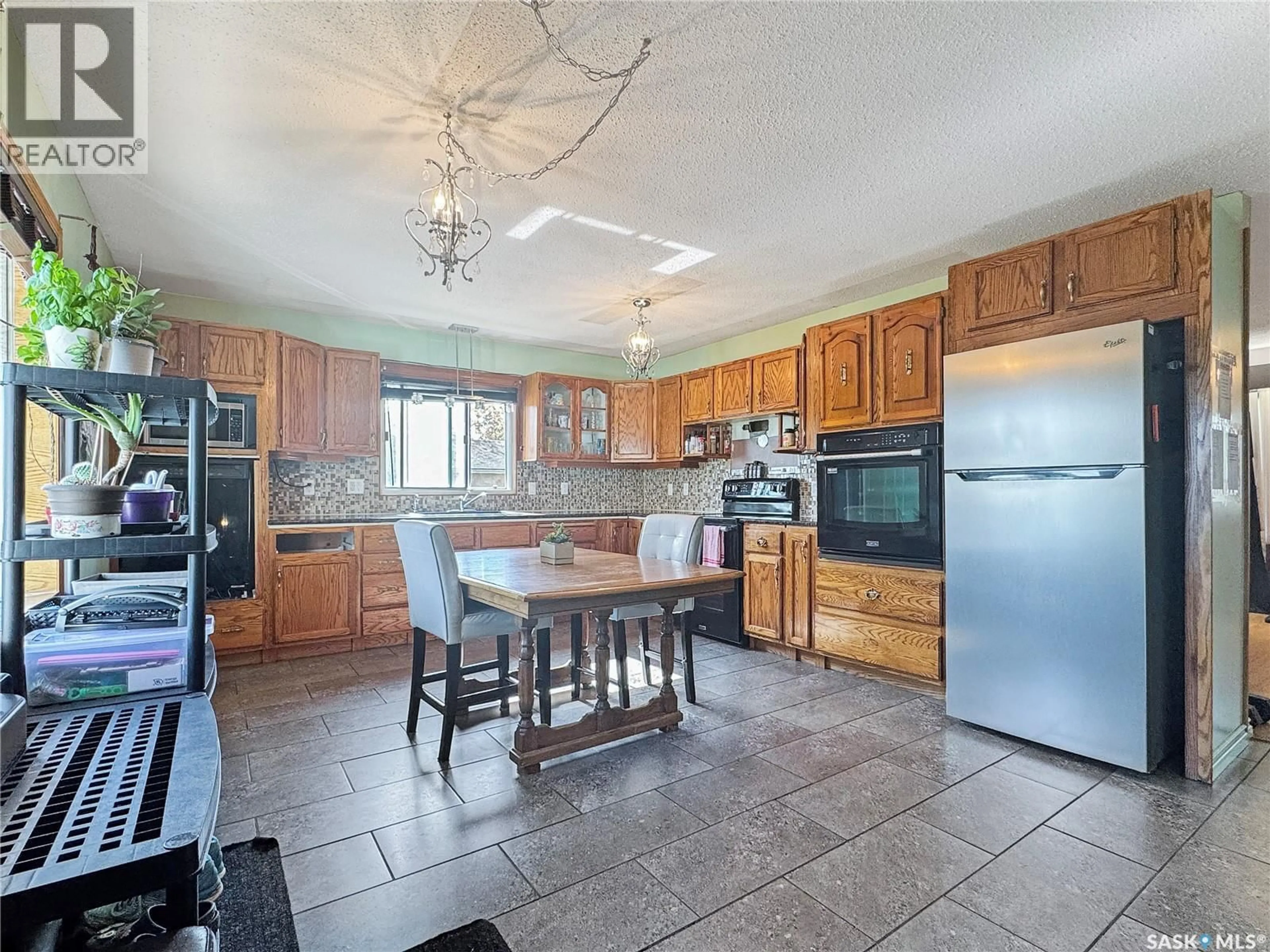 Open concept kitchen, ceramic/tile floor for 106 STRANGE STREET, Cut Knife Saskatchewan S0M0N0
