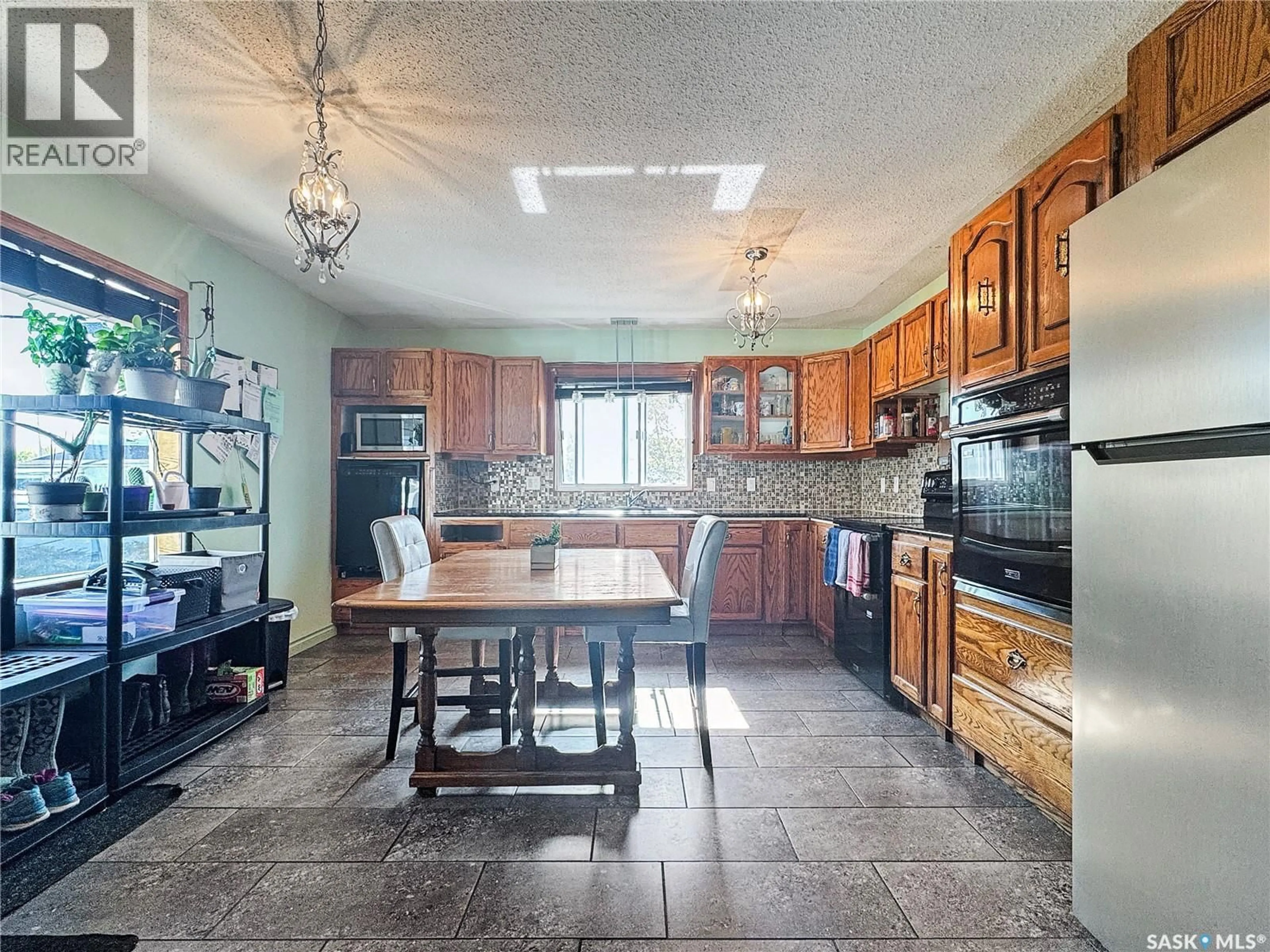 Open concept kitchen, ceramic/tile floor for 106 STRANGE STREET, Cut Knife Saskatchewan S0M0N0