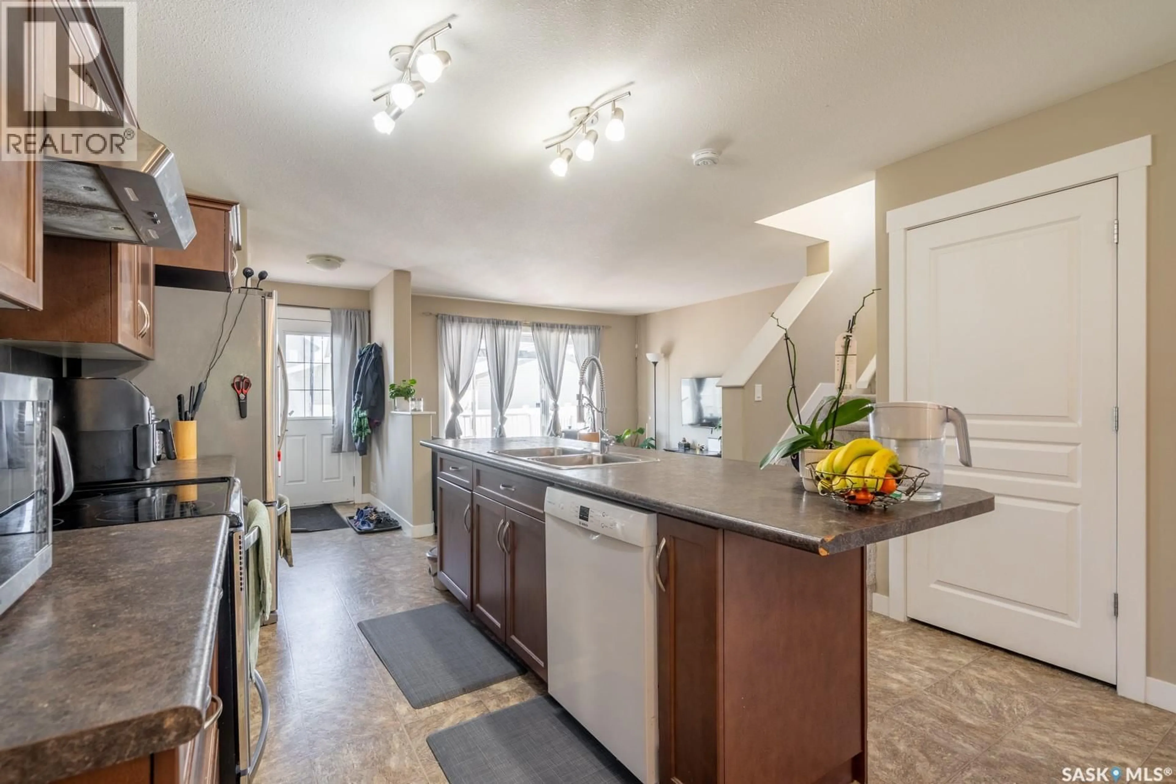 Open concept kitchen, ceramic/tile floor for 3669 GREEN BANK ROAD, Regina Saskatchewan S4V1M2