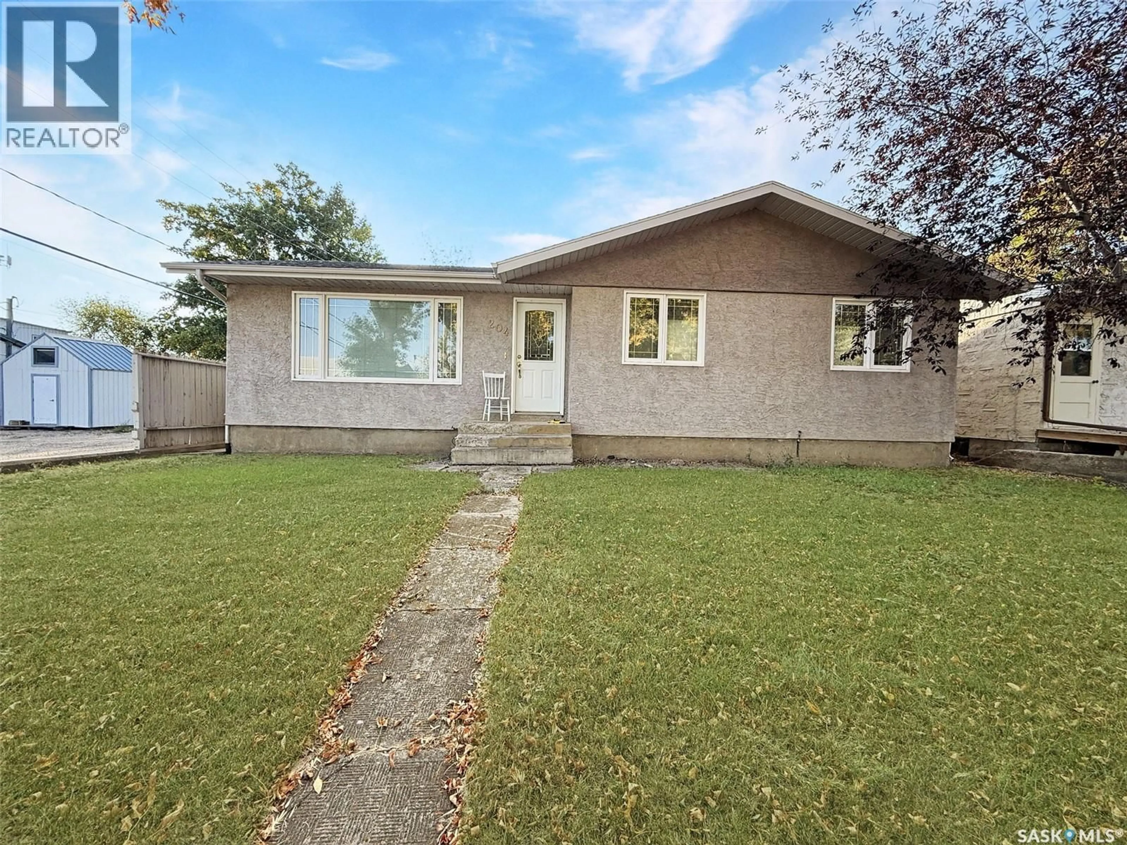 A pic from outside/outdoor area/front of a property/back of a property/a pic from drone, street for 204 BROWNLEE STREET, Herbert Saskatchewan S0H2A0
