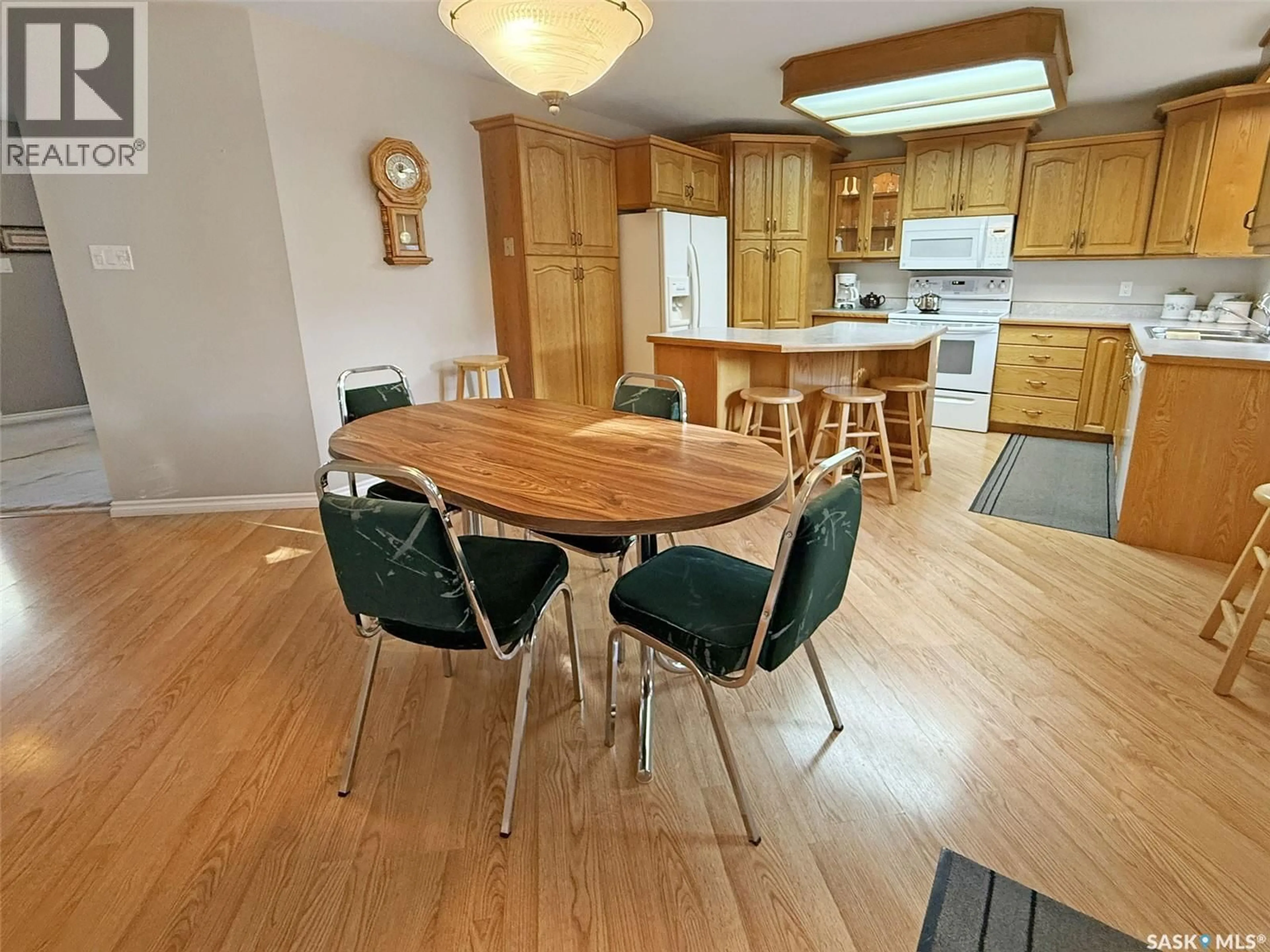 Dining room, wood/laminate floor for 204 BROWNLEE STREET, Herbert Saskatchewan S0H2A0
