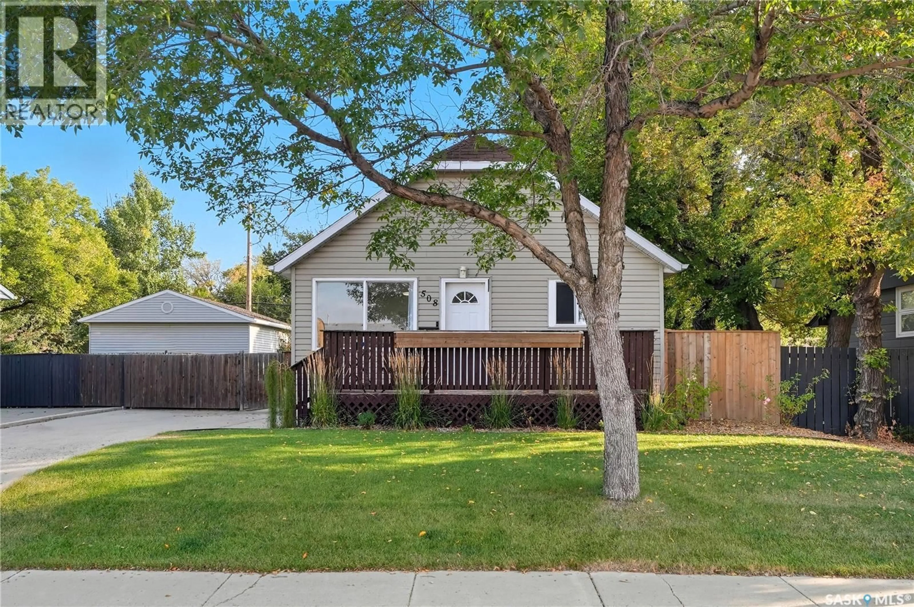 Home with vinyl exterior material, street for 508 GRAY AVENUE, Saskatoon Saskatchewan S7N2S1