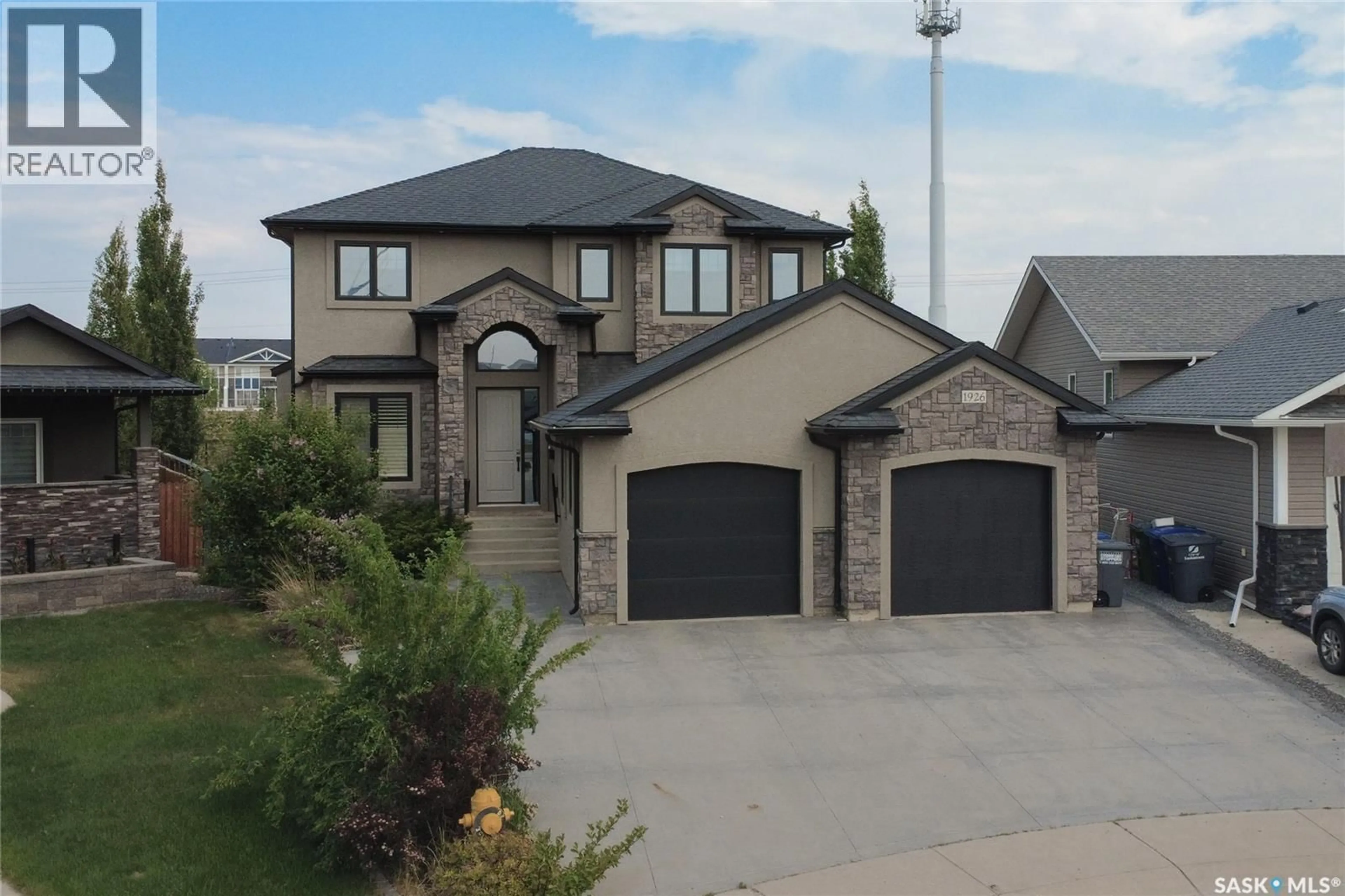 Home with brick exterior material, street for 1926 POHORECKY TERRACE, Saskatoon Saskatchewan S7W0J1