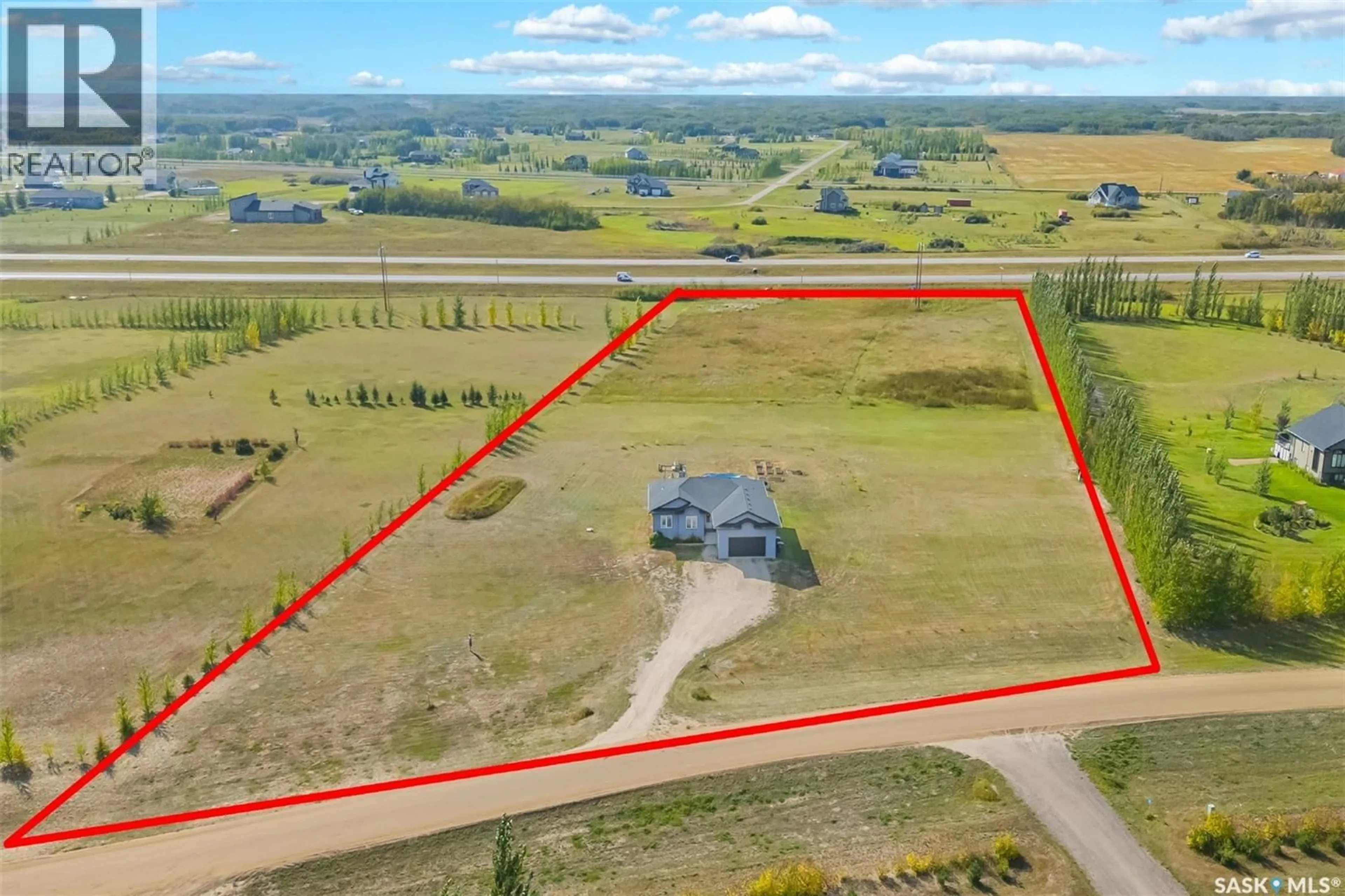 A pic from outside/outdoor area/front of a property/back of a property/a pic from drone, water/lake/river/ocean view for 25 SOUTH COUNTRY ROAD, Dundurn Rm No. 314 Saskatchewan S7C0B1