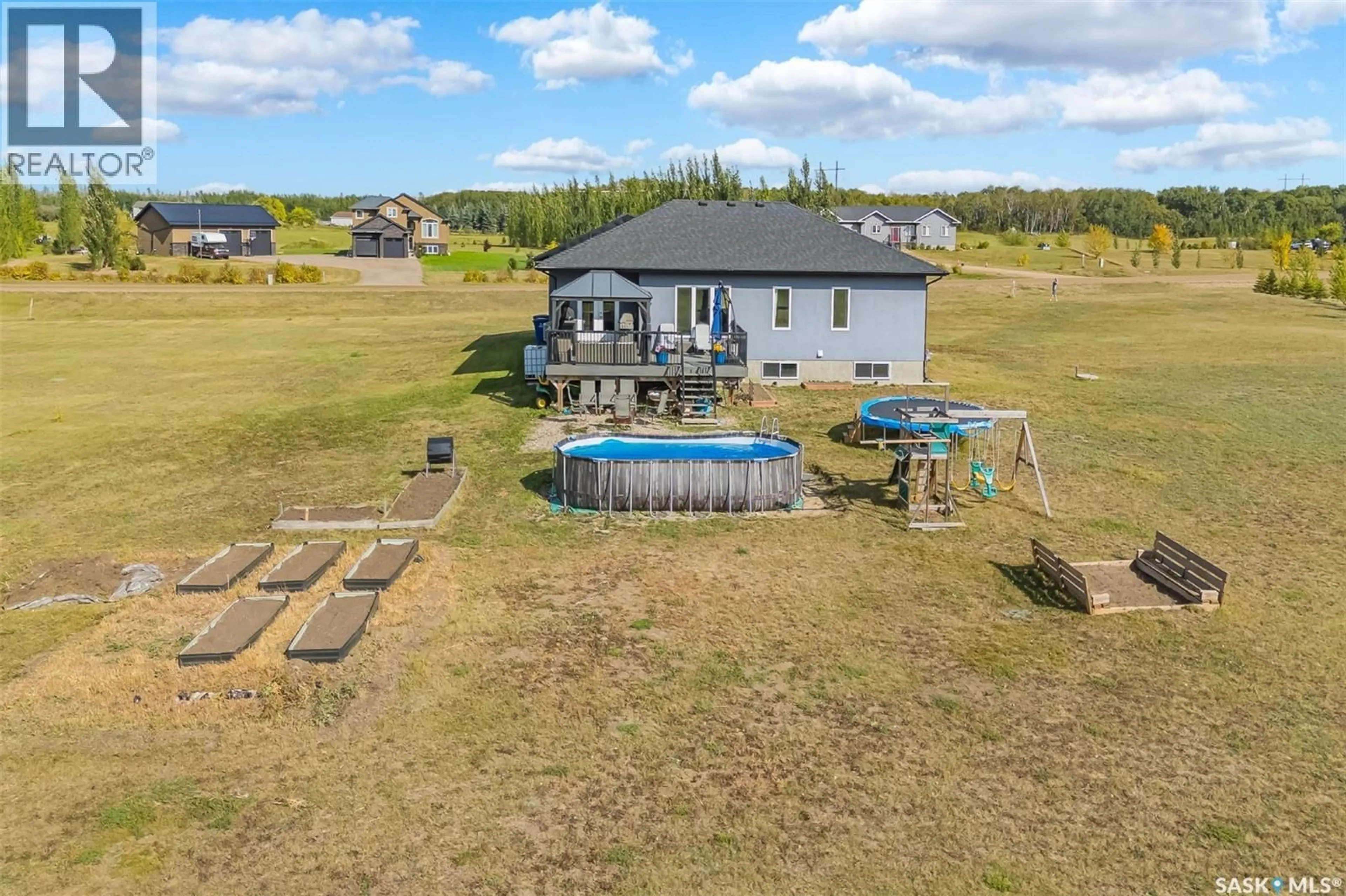 A pic from outside/outdoor area/front of a property/back of a property/a pic from drone, water/lake/river/ocean view for 25 SOUTH COUNTRY ROAD, Dundurn Rm No. 314 Saskatchewan S7C0B1