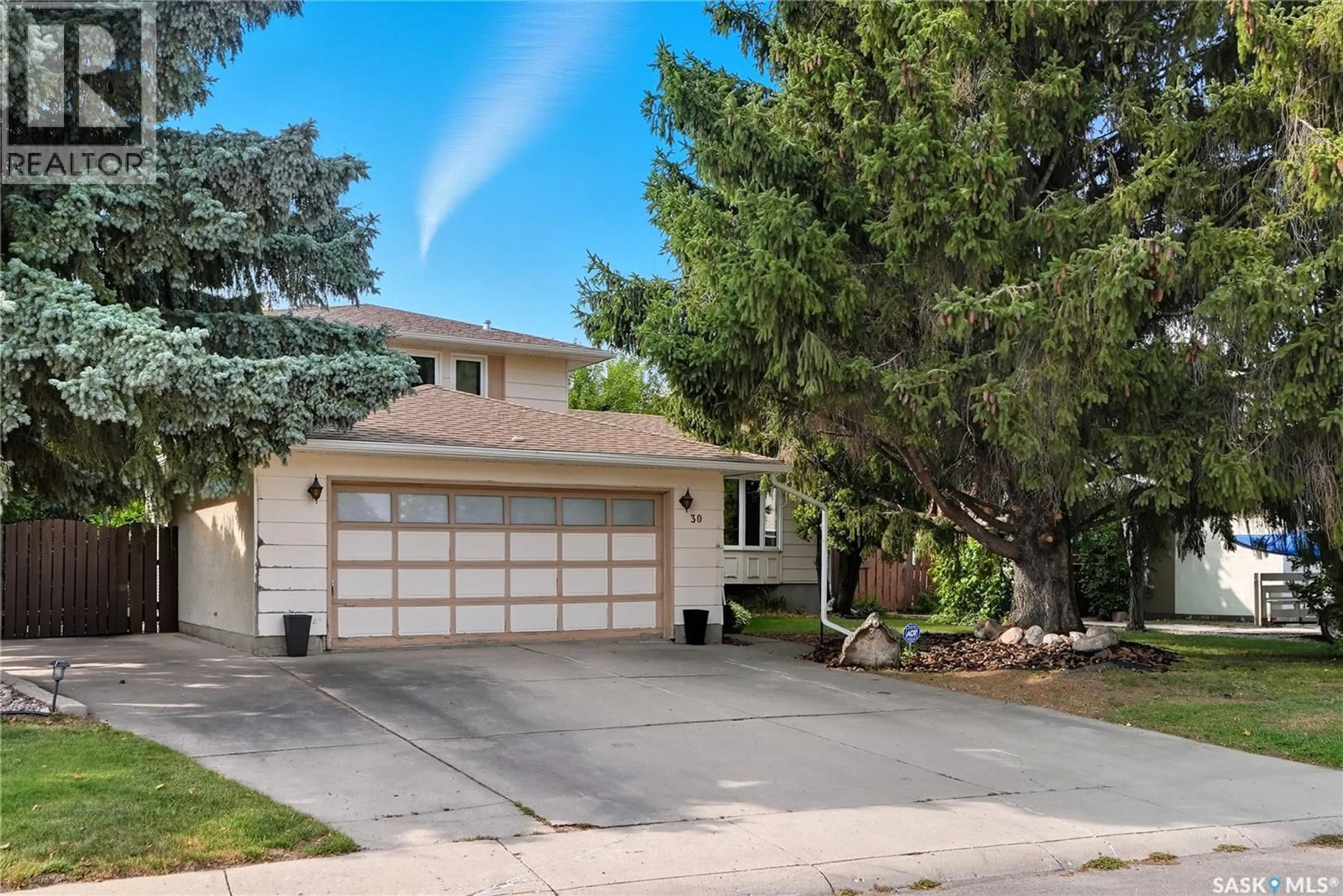 Home with vinyl exterior material, street for 30 CHAMPLIN CRESCENT, Saskatoon Saskatchewan S7H4T3