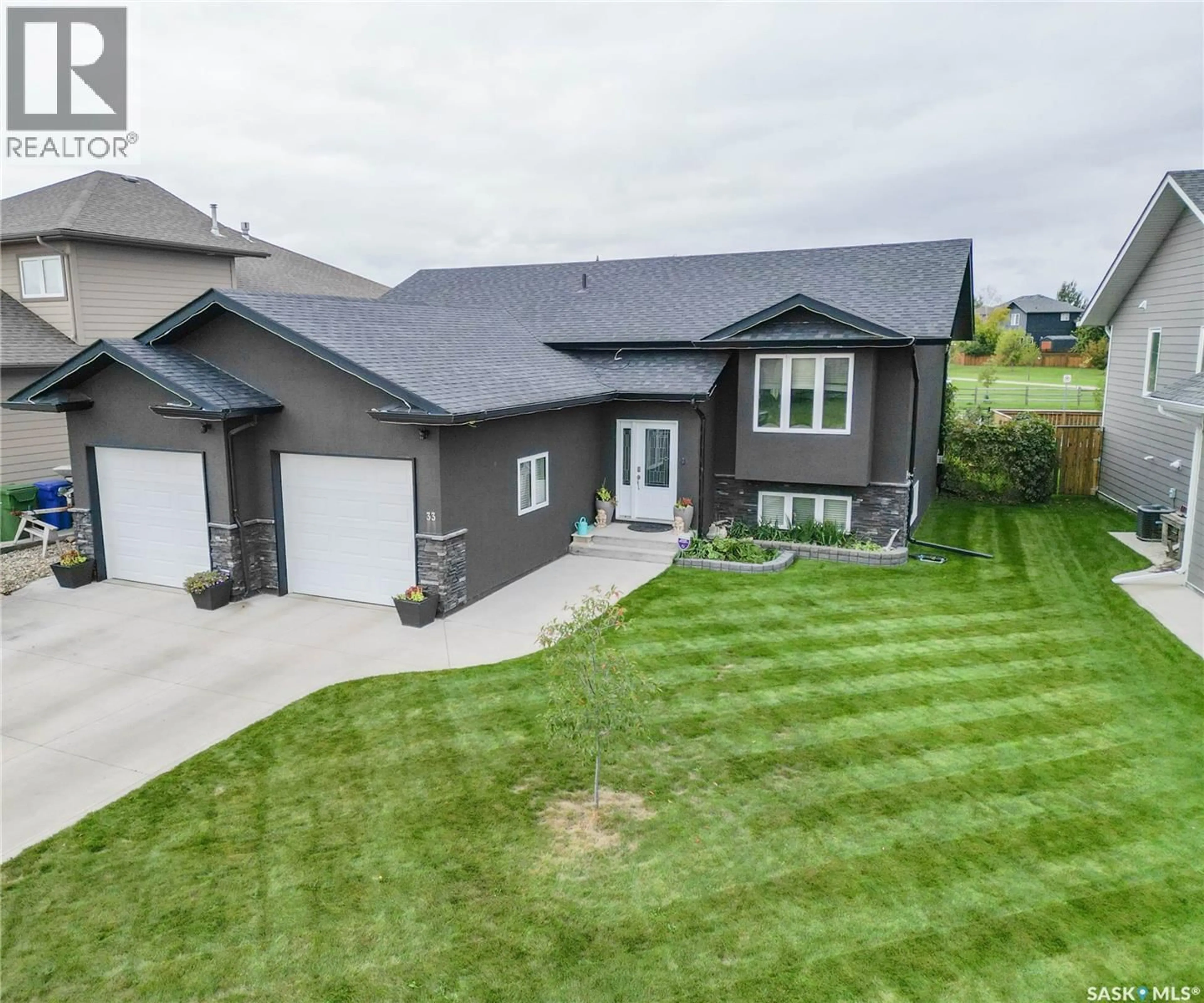 A pic from outside/outdoor area/front of a property/back of a property/a pic from drone, street for 33 SMILEY DRIVE, Prince Albert Saskatchewan S6X0B3