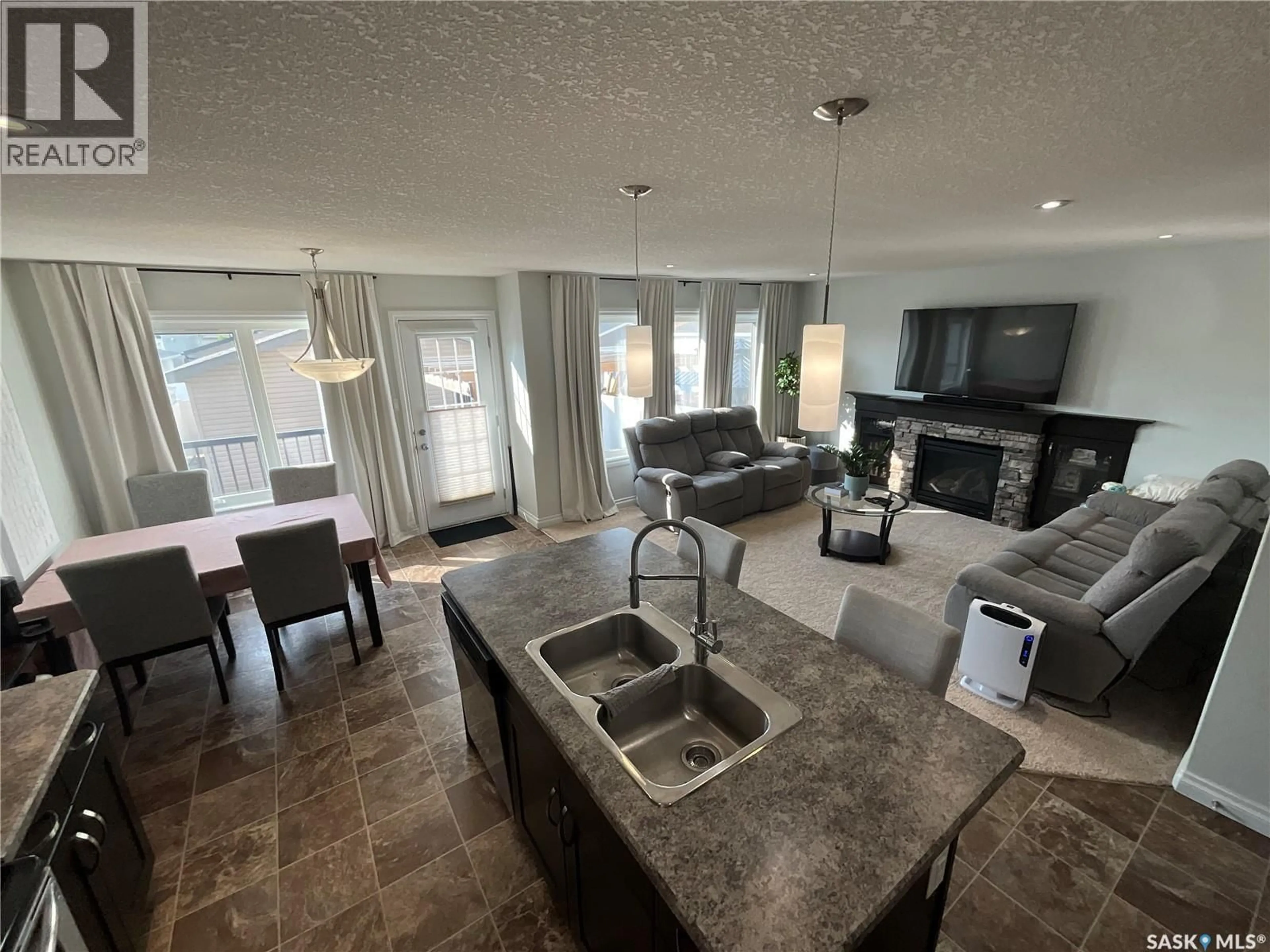 Open concept kitchen, unknown for 8709 HINCKS LANE, Regina Saskatchewan S4Y0B9