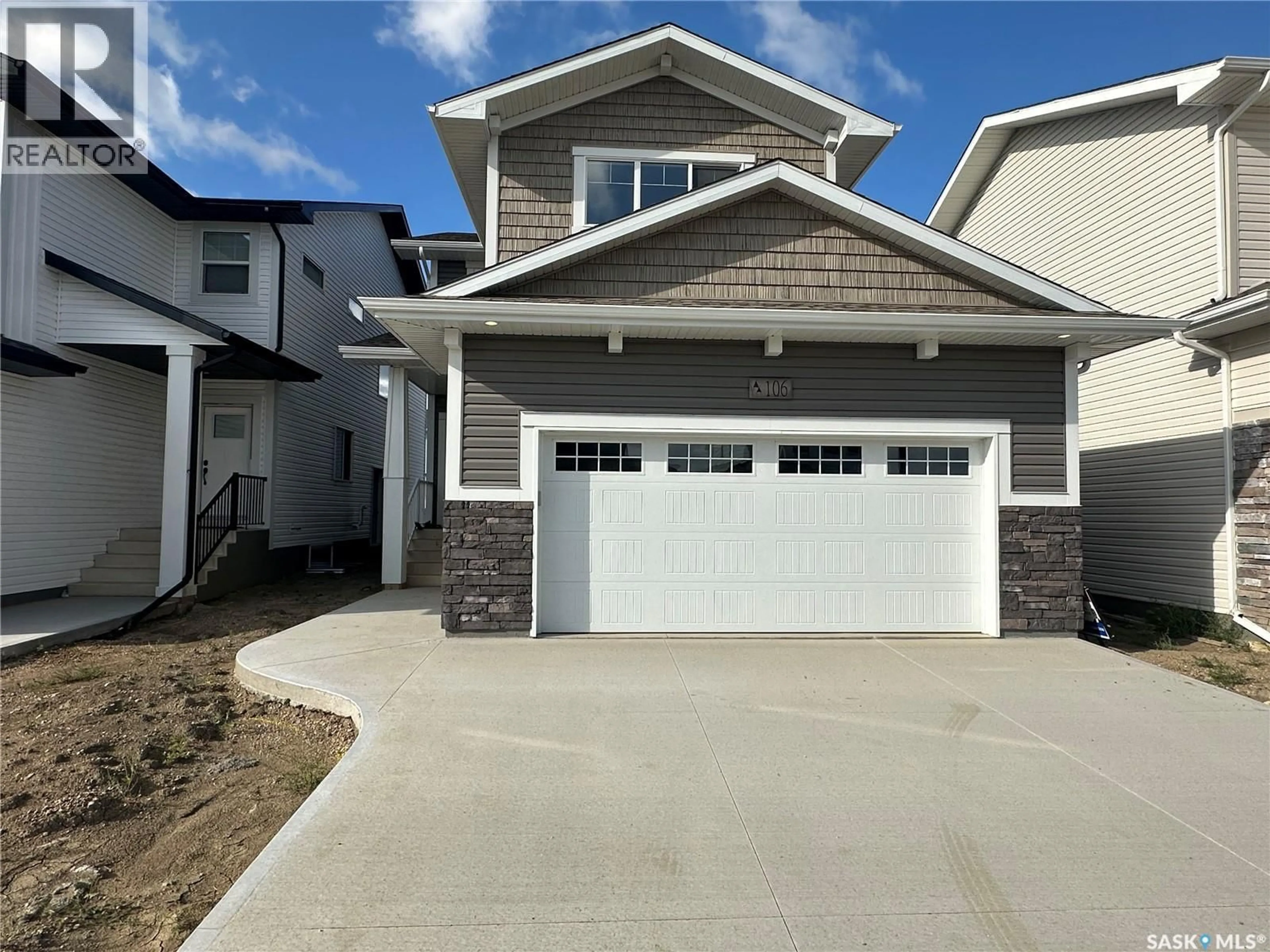 Home with vinyl exterior material, street for 106 KATZ AVENUE, Saskatoon Saskatchewan S7V1S9