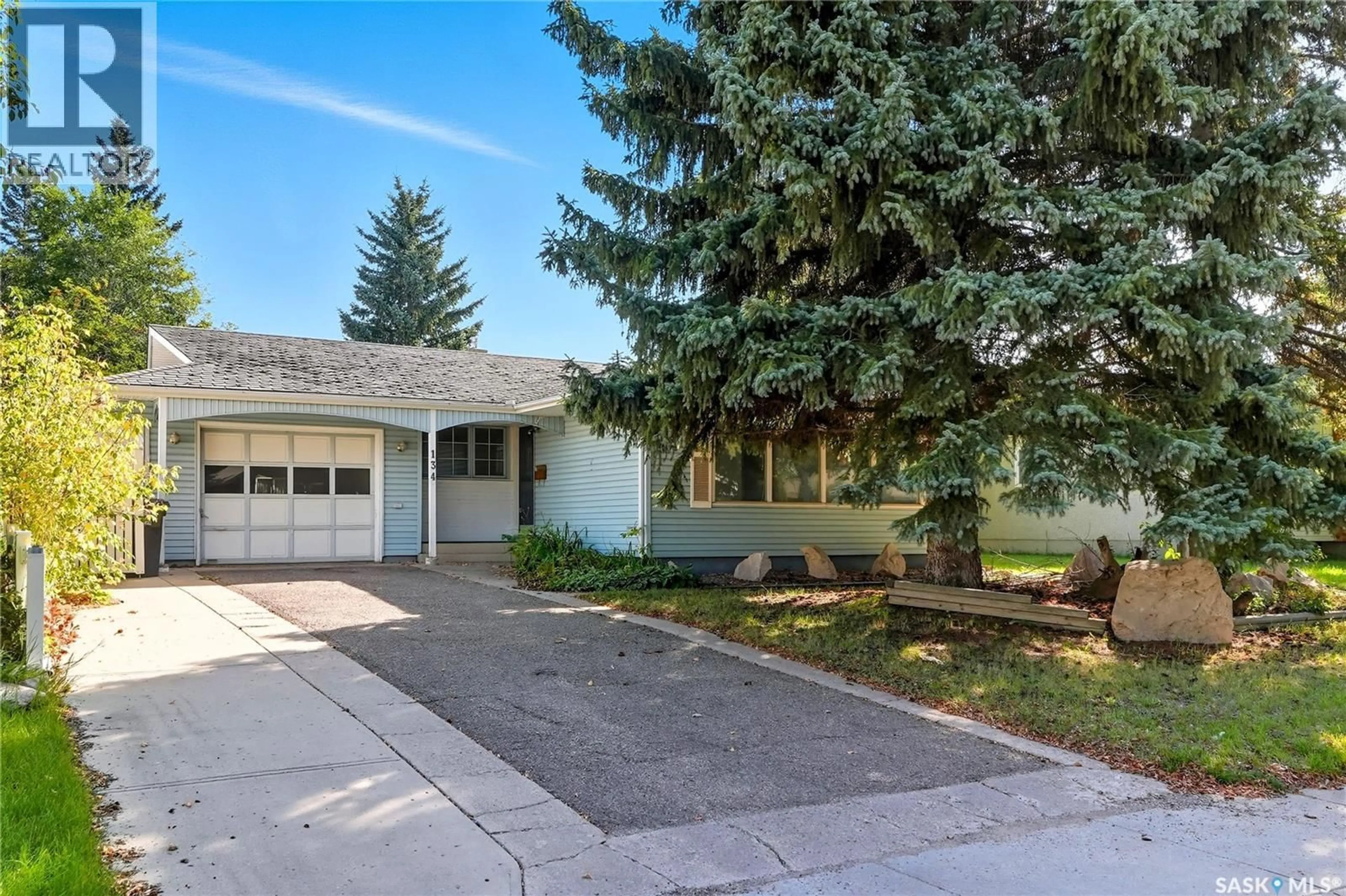 Home with vinyl exterior material, street for 134 O'NEIL CRESCENT, Saskatoon Saskatchewan S7N1W8