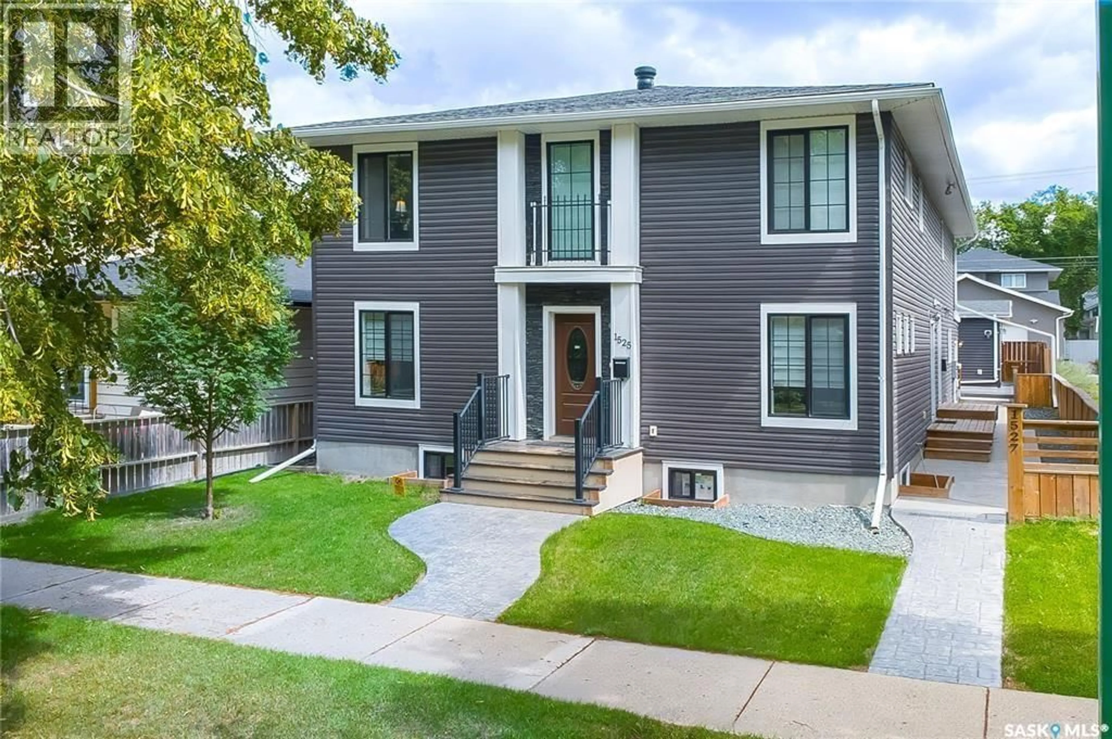 Home with vinyl exterior material, street for 1527 COY AVENUE, Saskatoon Saskatchewan S7M0H5