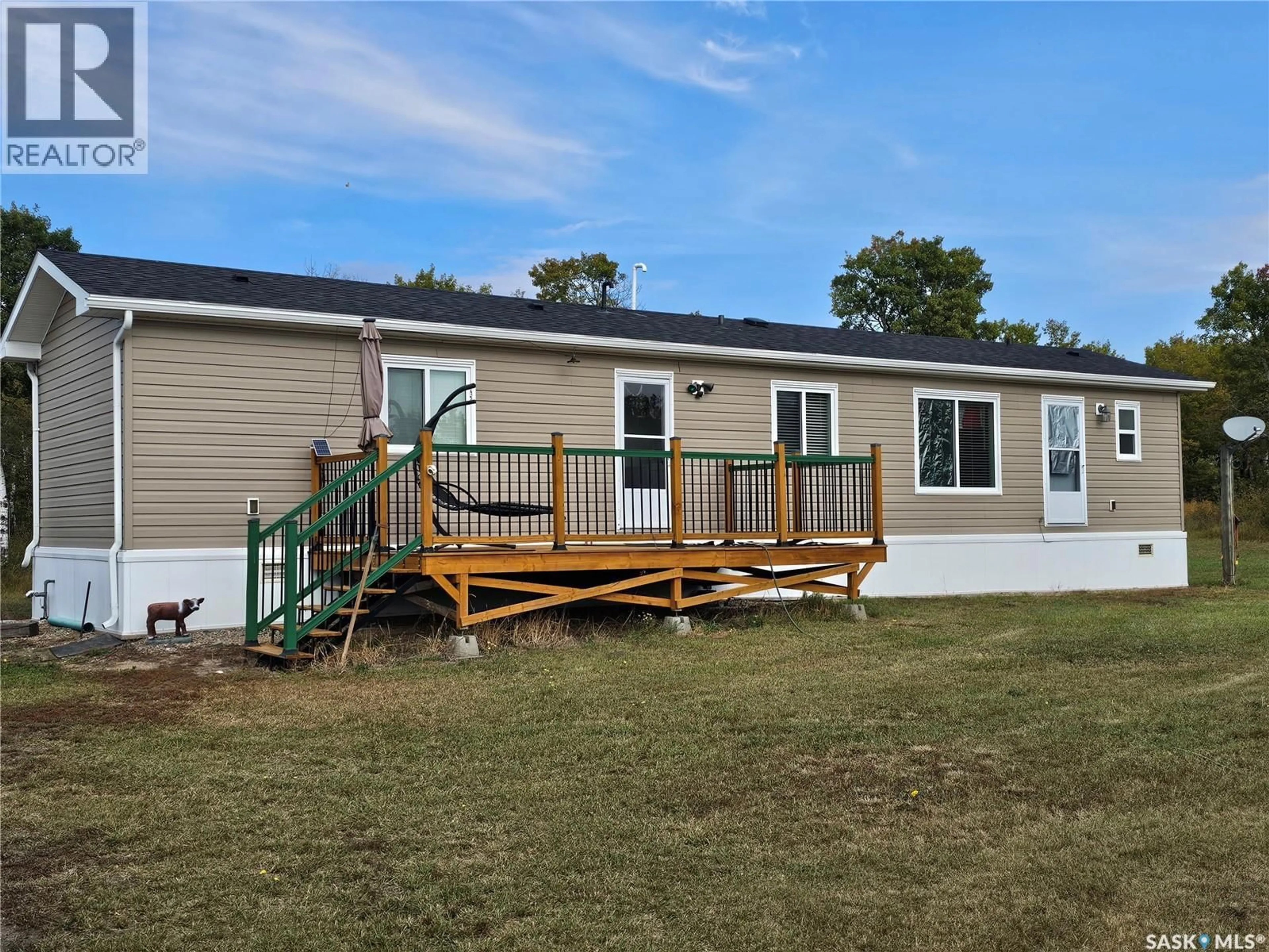 Home with vinyl exterior material, building for KINZEL ACREAGE, Vanscoy Saskatchewan S0K1B0