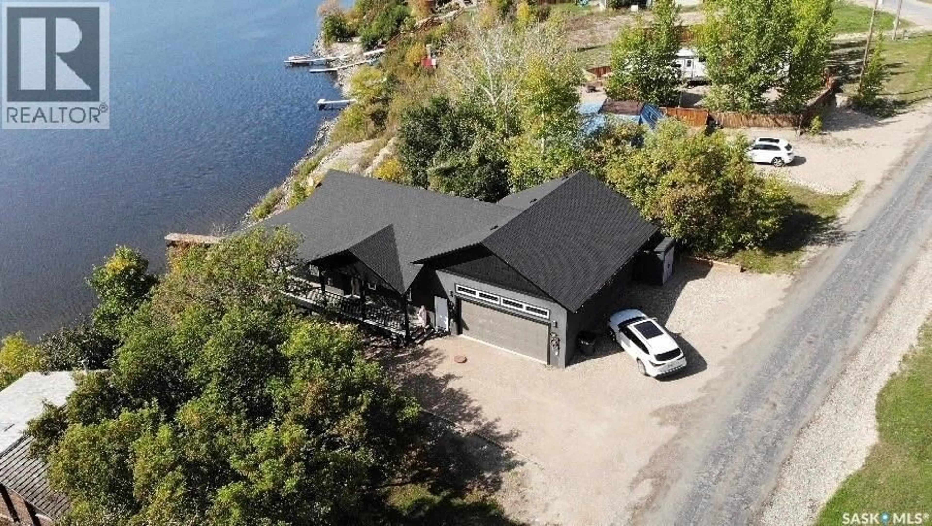 A pic from outside/outdoor area/front of a property/back of a property/a pic from drone, water/lake/river/ocean view for 402 ABEL DRIVE, Crooked Lake Saskatchewan S0G5L0