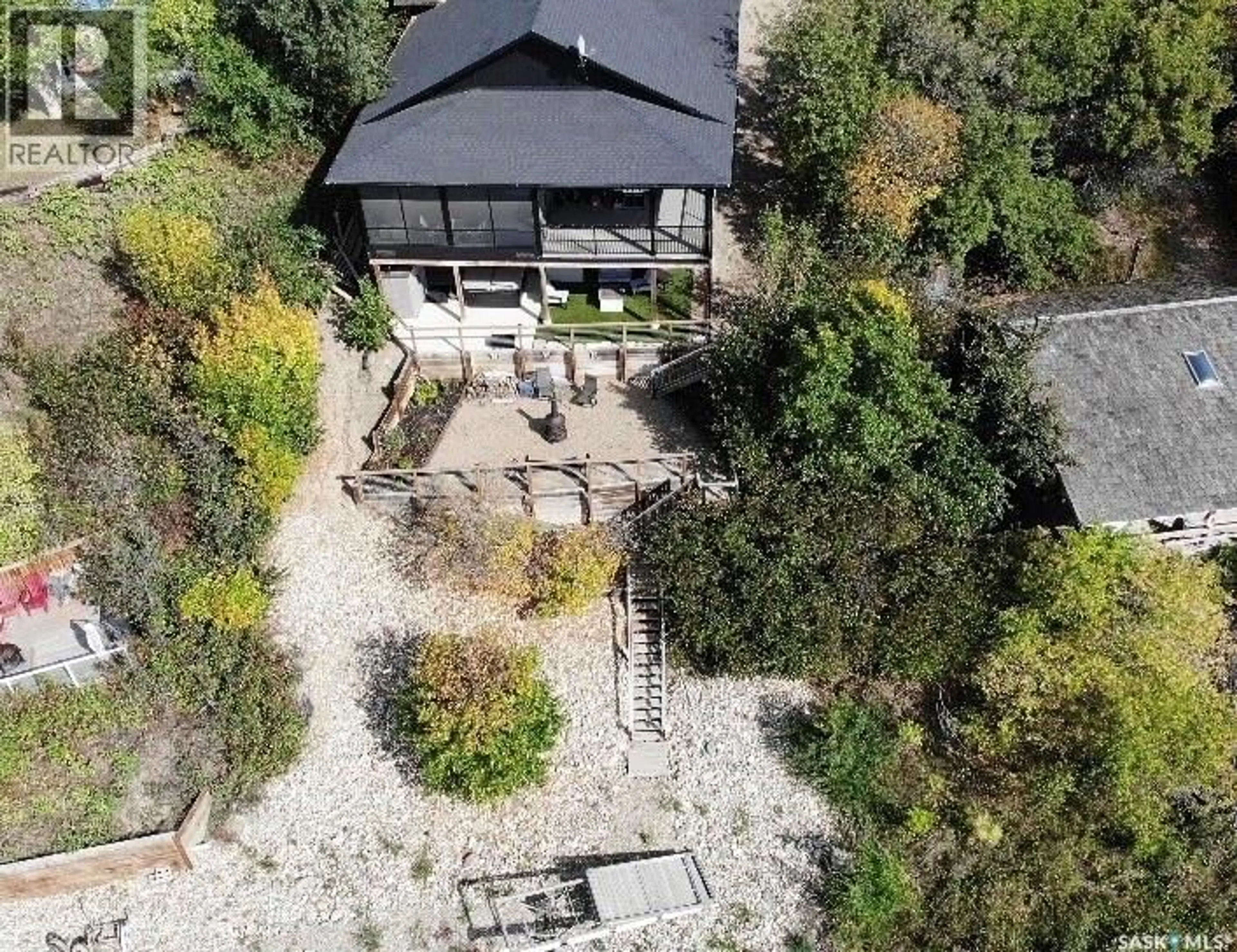 A pic from outside/outdoor area/front of a property/back of a property/a pic from drone, unknown for 402 ABEL DRIVE, Crooked Lake Saskatchewan S0G5L0