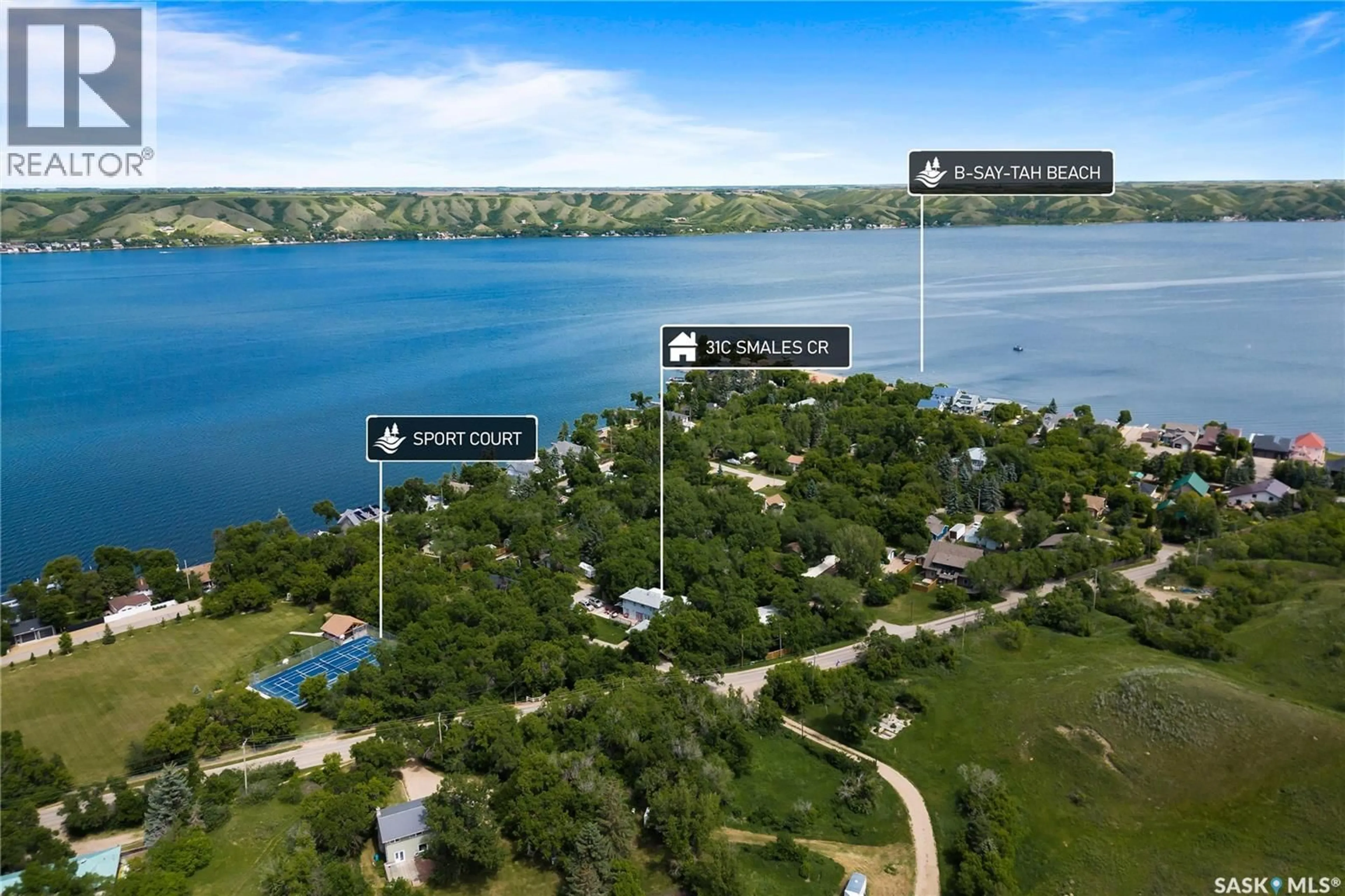 A pic from outside/outdoor area/front of a property/back of a property/a pic from drone, water/lake/river/ocean view for 31C SMALES CRESCENT, B-Say-Tah Saskatchewan S0G1S0