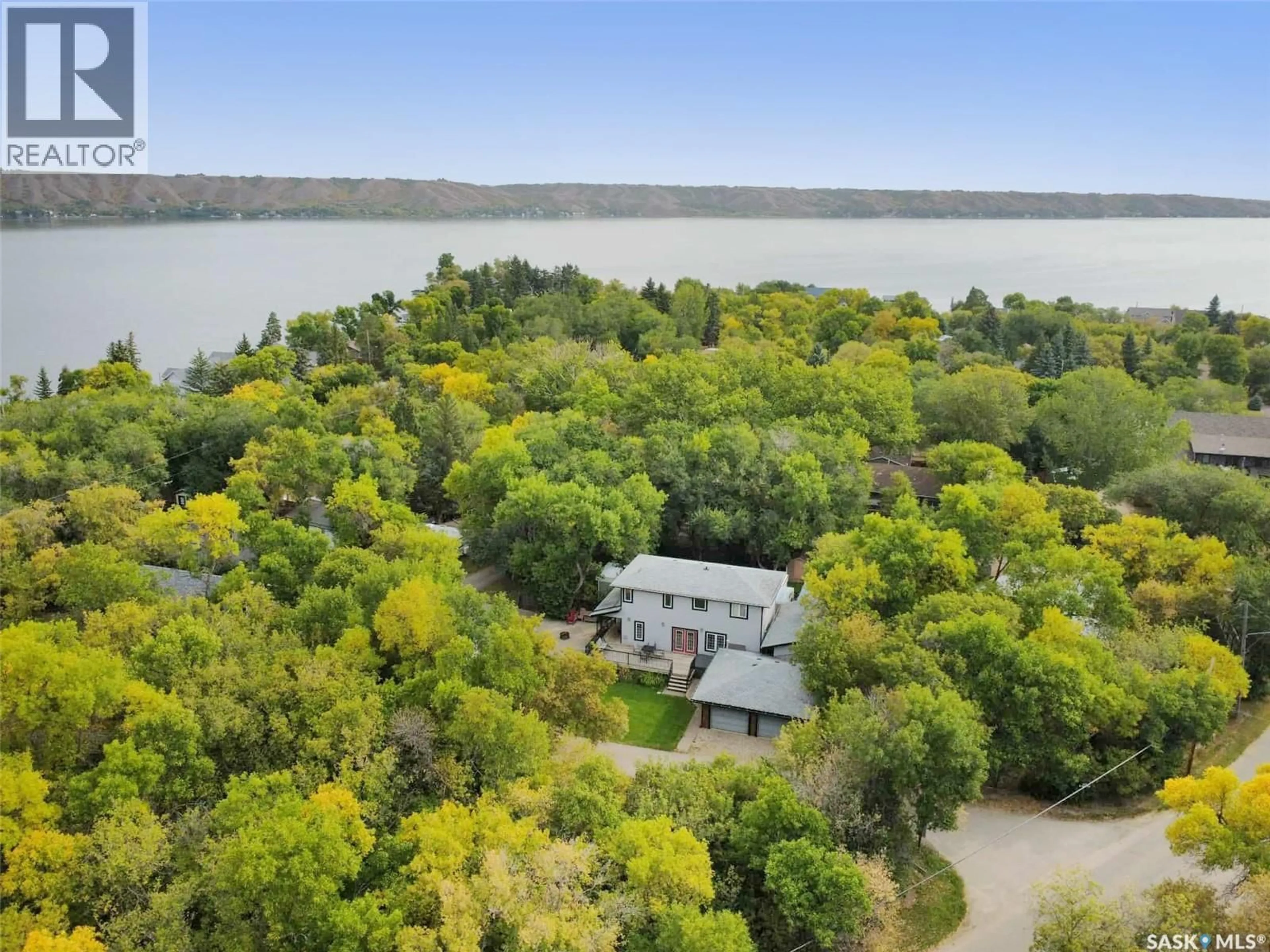 A pic from outside/outdoor area/front of a property/back of a property/a pic from drone, water/lake/river/ocean view for 31C SMALES CRESCENT, B-Say-Tah Saskatchewan S0G1S0