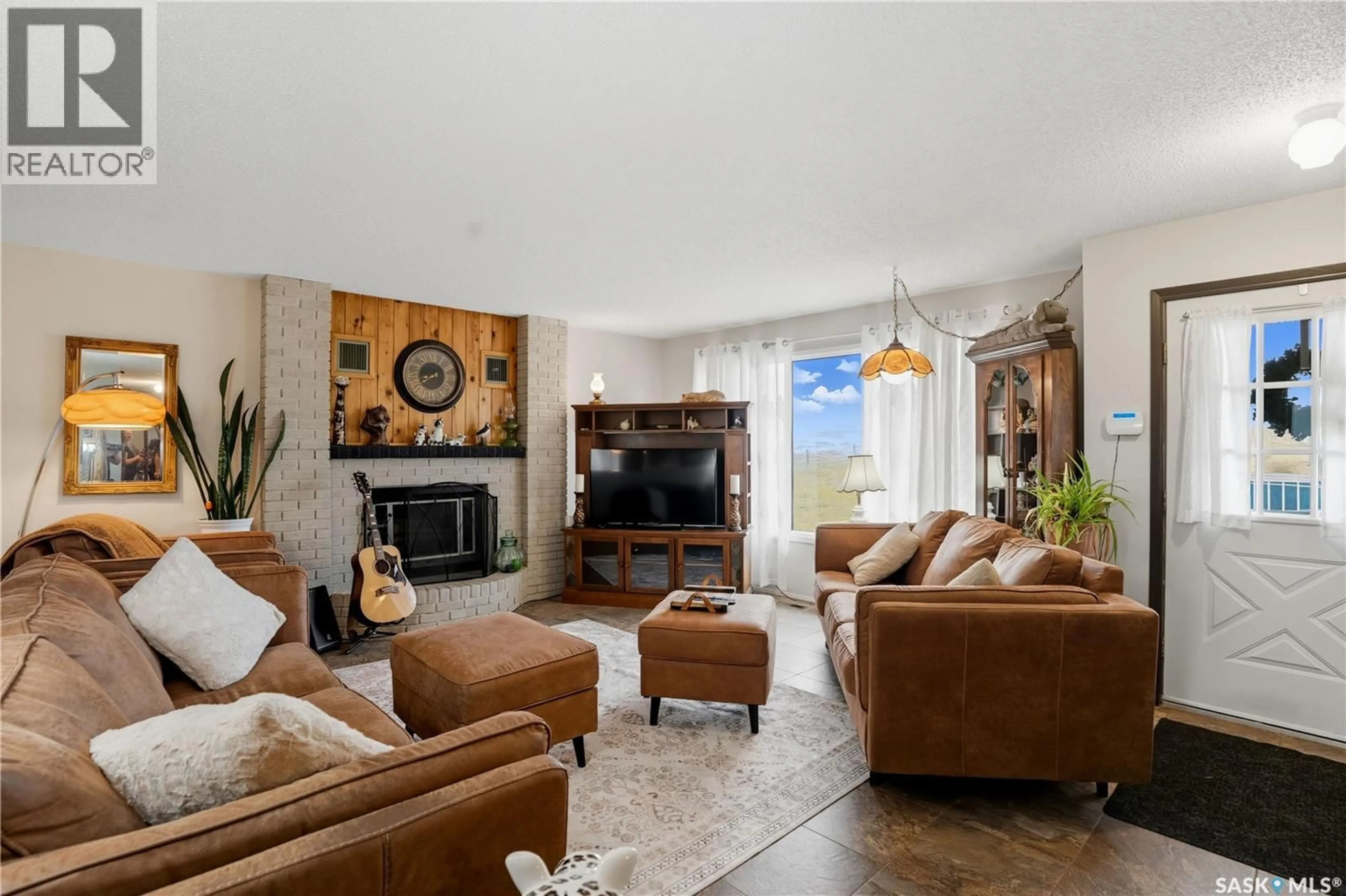 Living room with furniture, ceramic/tile floor for LAWRENCE ACREAGE, Moose Jaw Rm No. 161 Saskatchewan S6H4N9