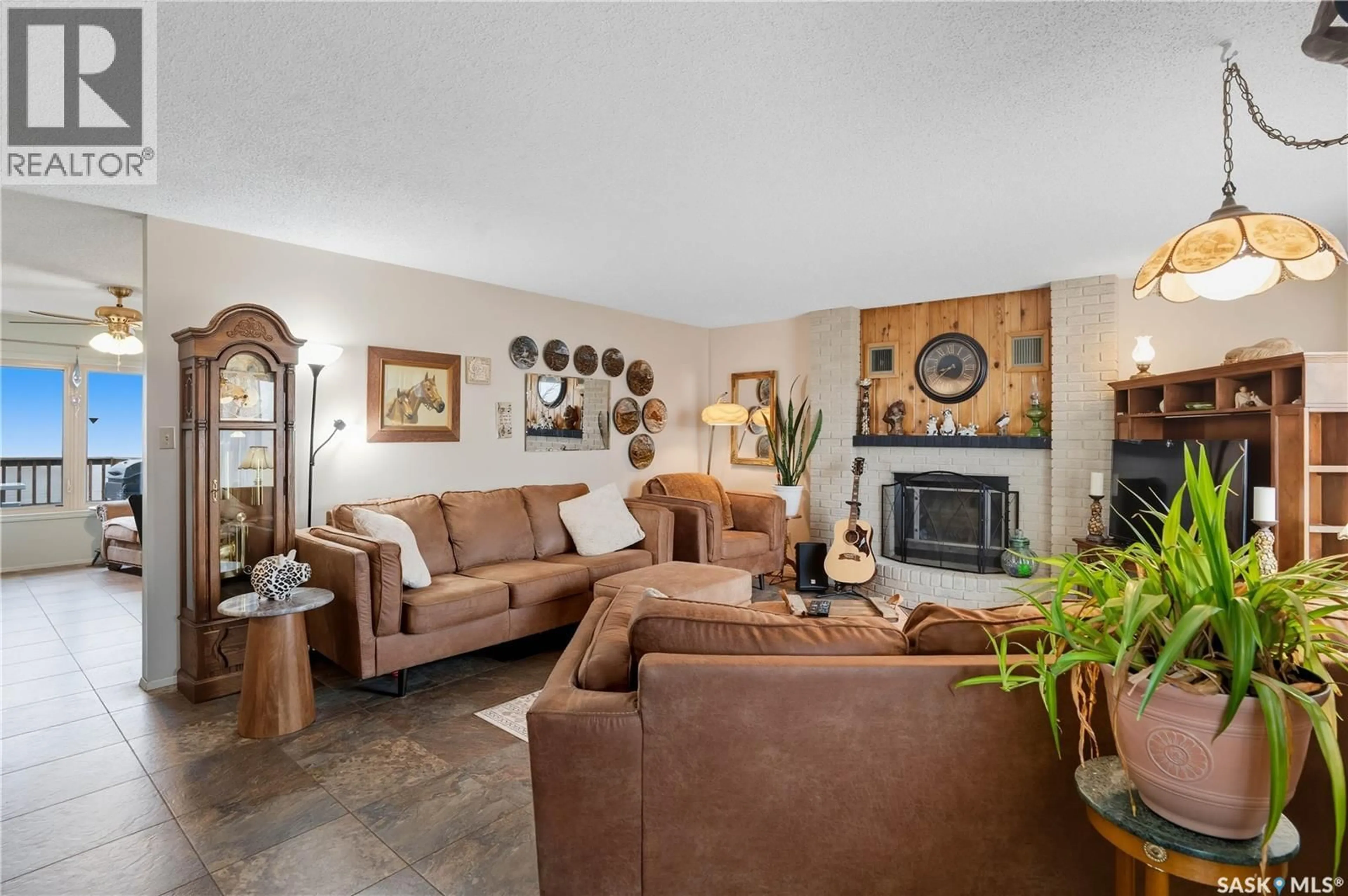 Living room with furniture, ceramic/tile floor for LAWRENCE ACREAGE, Moose Jaw Rm No. 161 Saskatchewan S6H4N9