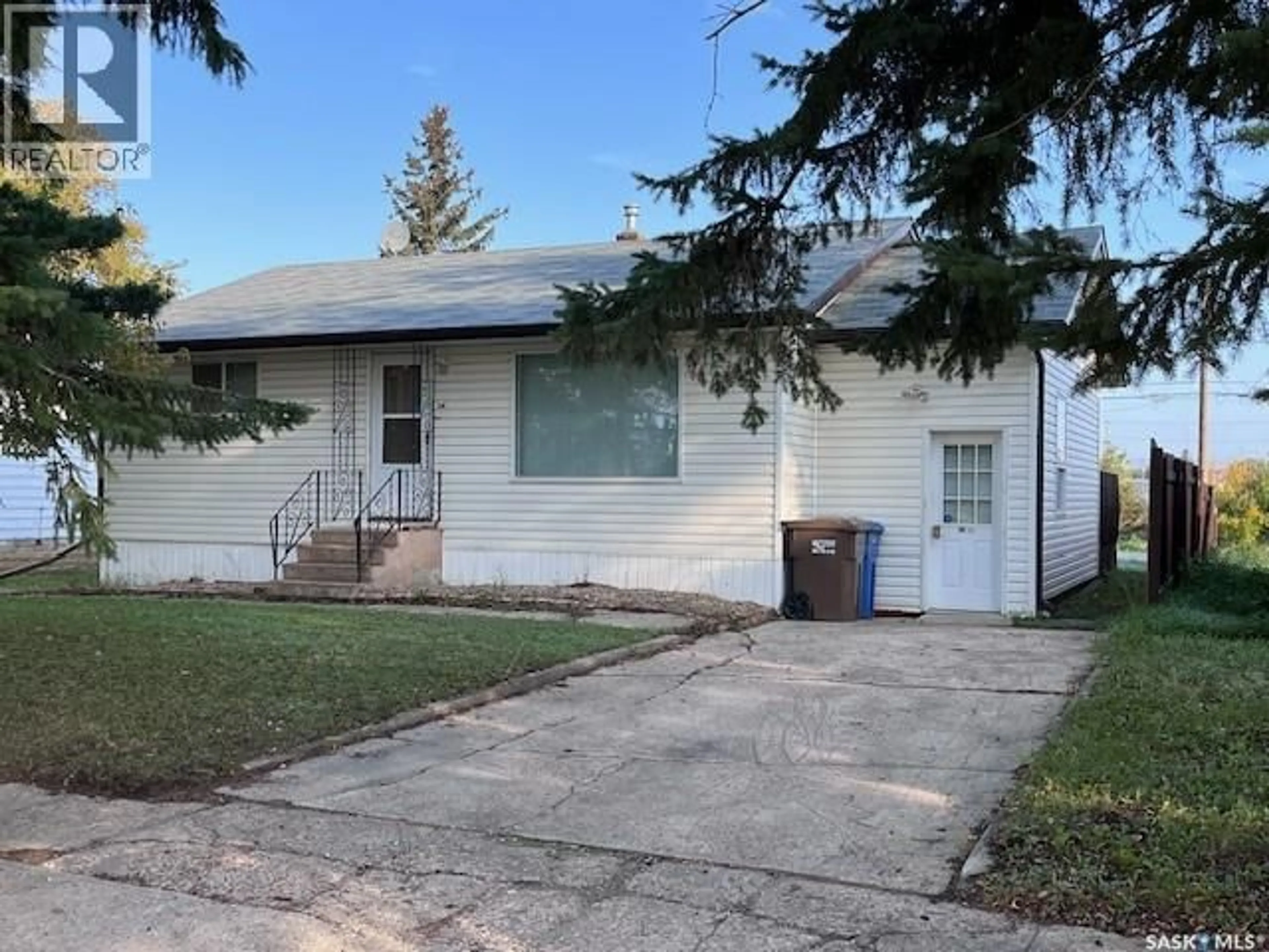 Home with vinyl exterior material, street for 110 MATILDA STREET, Melfort Saskatchewan S0E1A0
