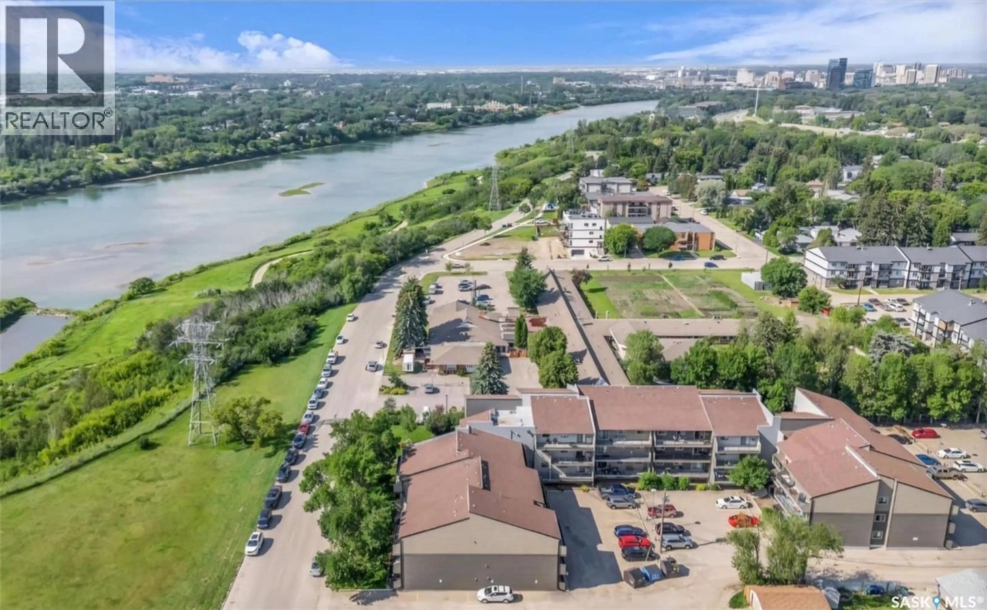 A pic from outside/outdoor area/front of a property/back of a property/a pic from drone, water/lake/river/ocean view for 312 2233 ST HENRY AVENUE, Saskatoon Saskatchewan S7K5M6