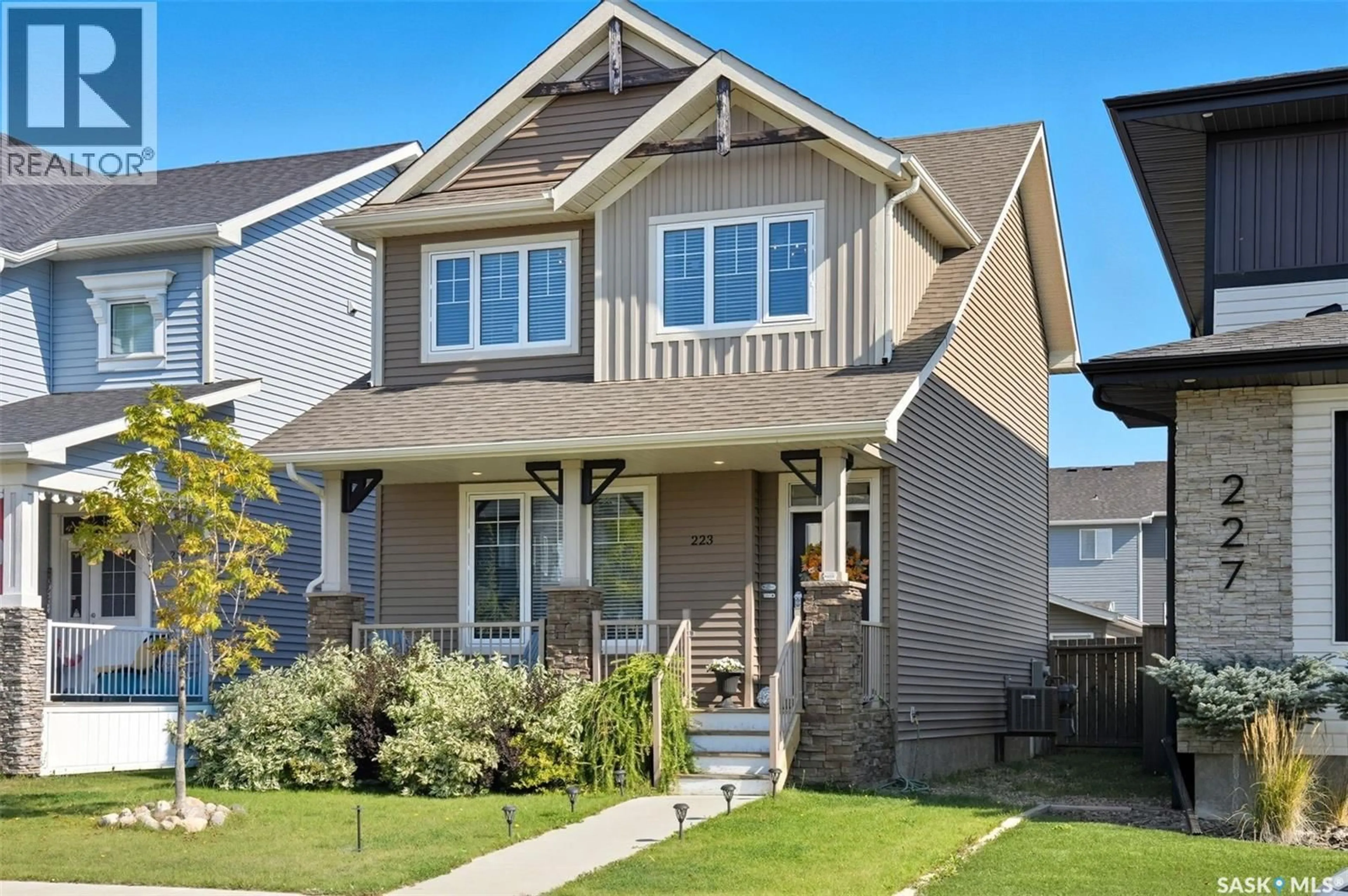 Home with vinyl exterior material, street for 223 SECORD WAY, Saskatoon Saskatchewan S7V0L9