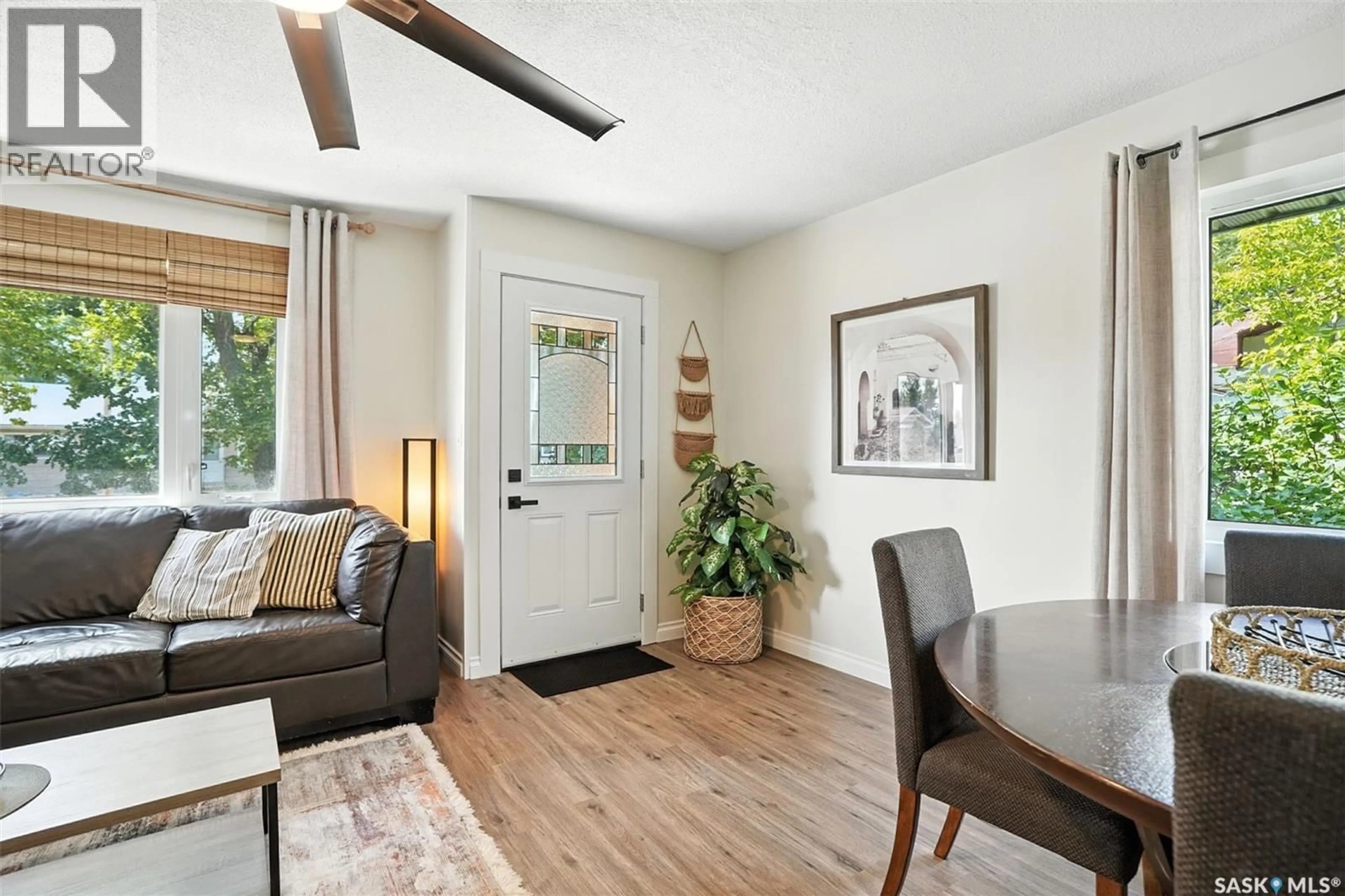 Living room with furniture, wood/laminate floor for 301 3RD AVENUE, Nokomis Saskatchewan S0G3R0