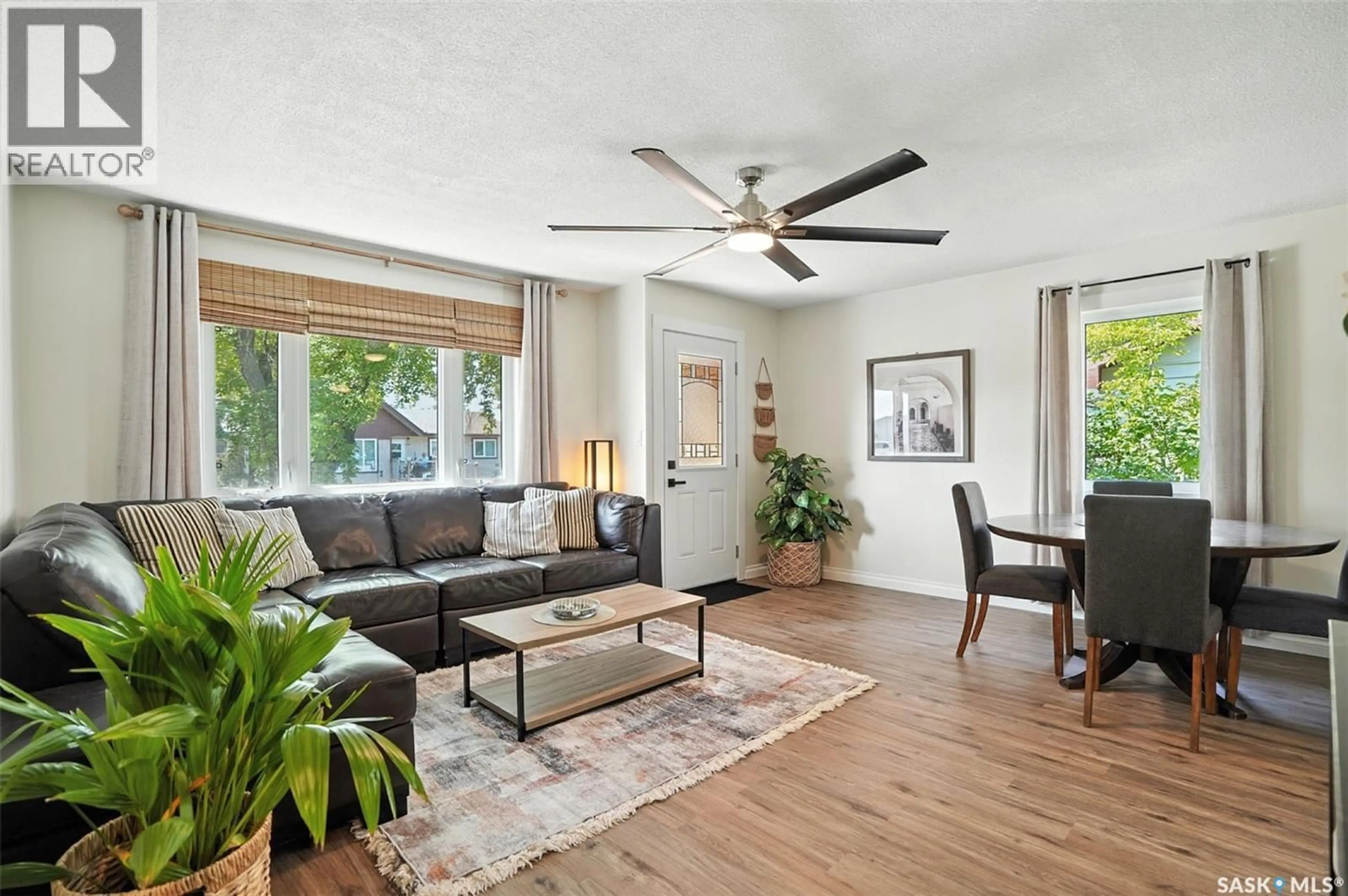 Living room with furniture, wood/laminate floor for 301 3RD AVENUE, Nokomis Saskatchewan S0G3R0