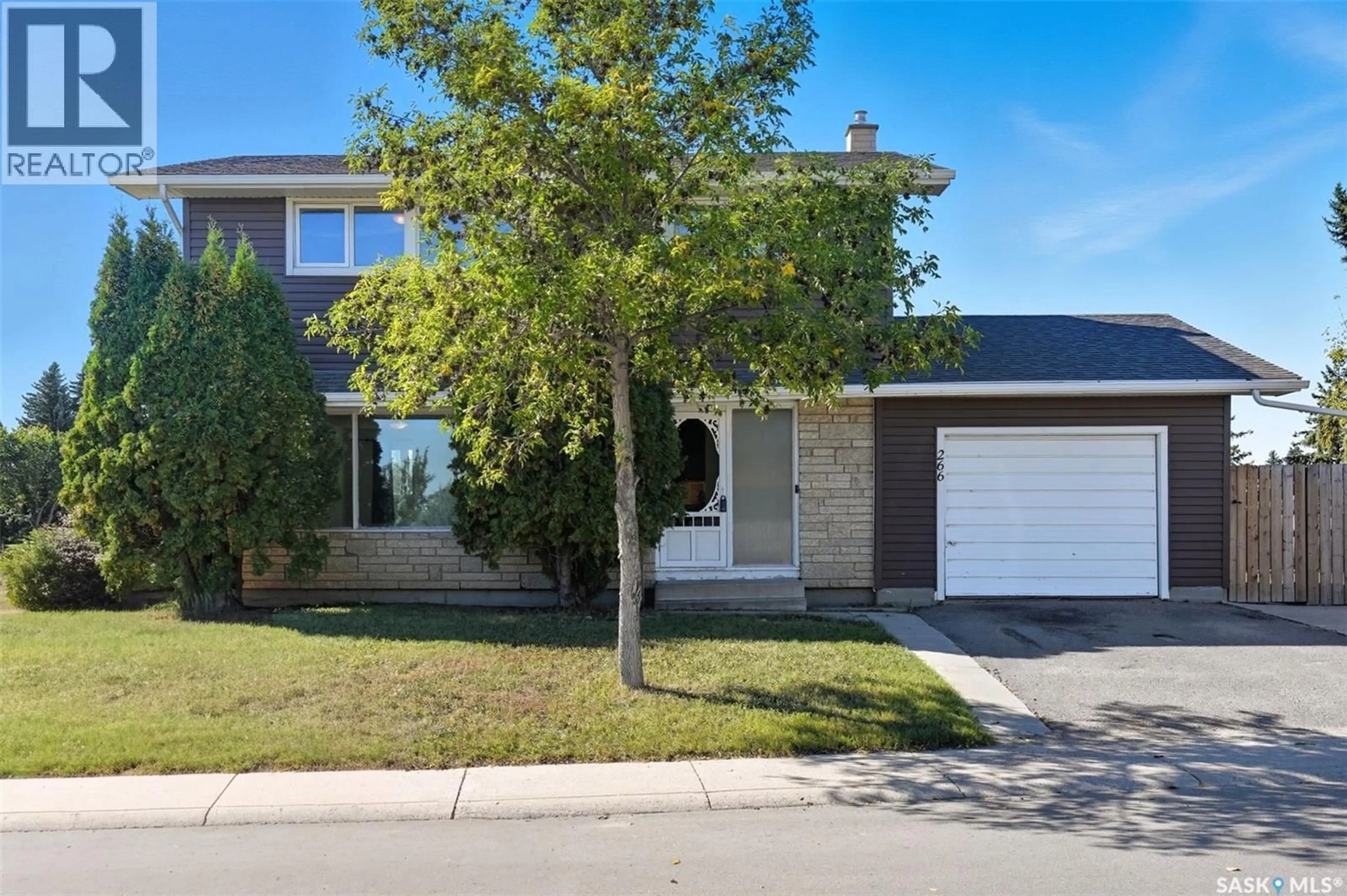 Home with brick exterior material, street for 266 ASSINIBOINE DRIVE, Saskatoon Saskatchewan S7K4A2