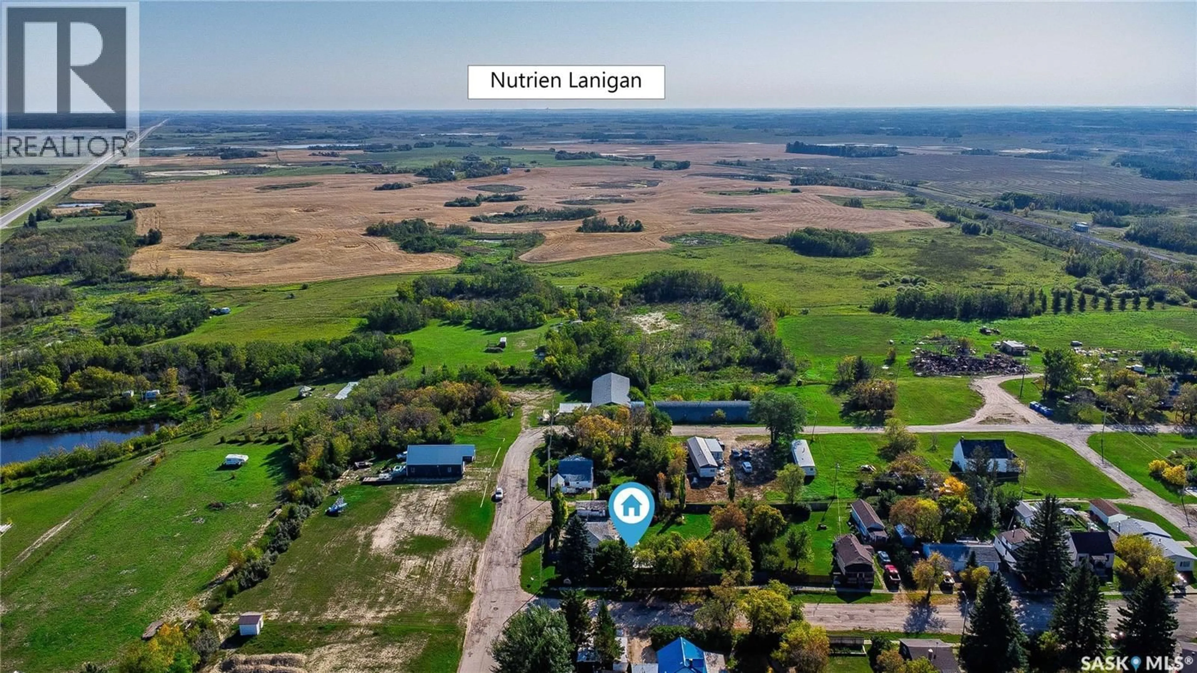 A pic from outside/outdoor area/front of a property/back of a property/a pic from drone, water/lake/river/ocean view for 235 4TH STREET, Plunkett Saskatchewan S0K3J0