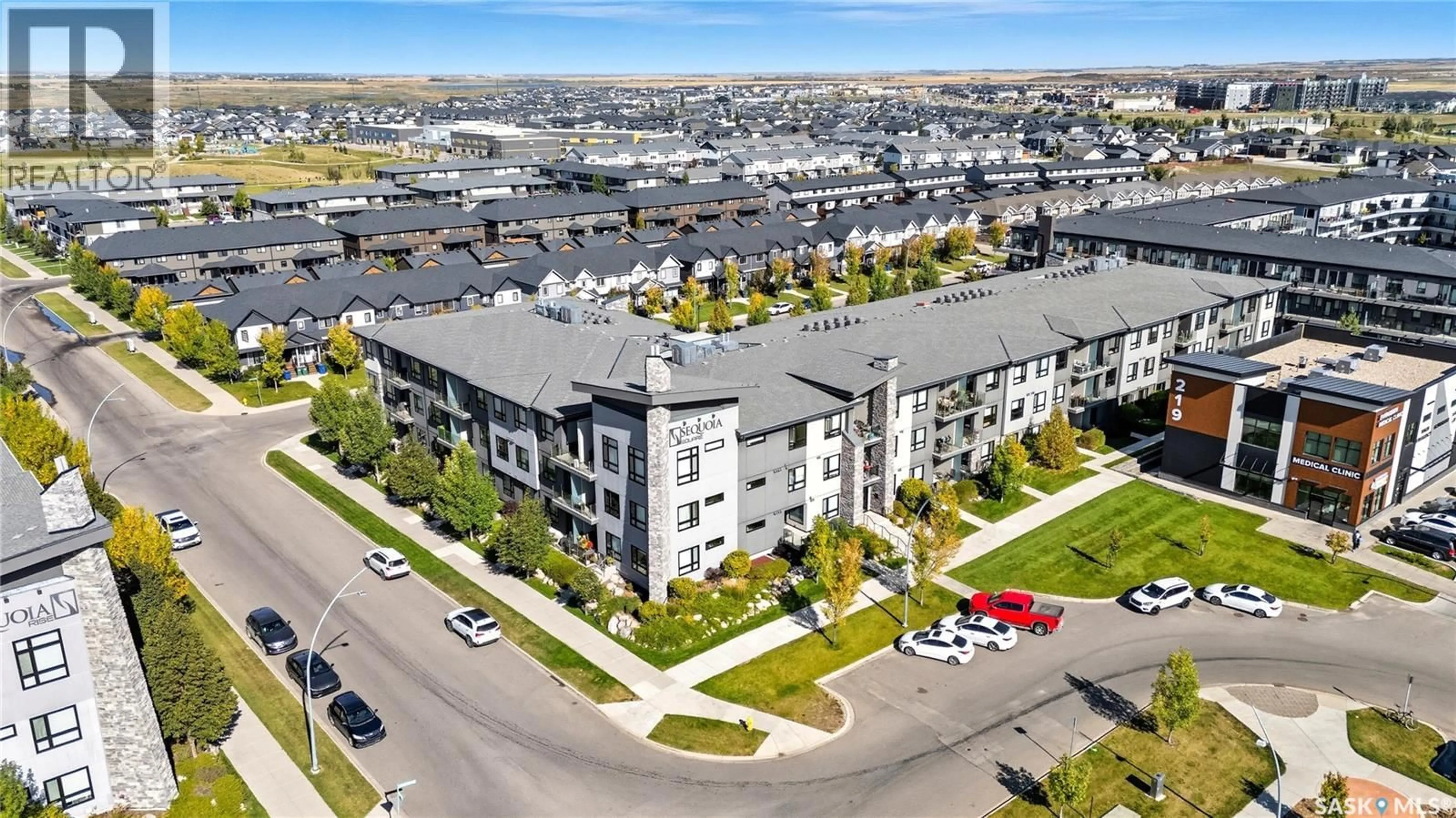 A pic from outside/outdoor area/front of a property/back of a property/a pic from drone, unknown for 111 223 EVERGREEN SQUARE, Saskatoon Saskatchewan S7W0W2