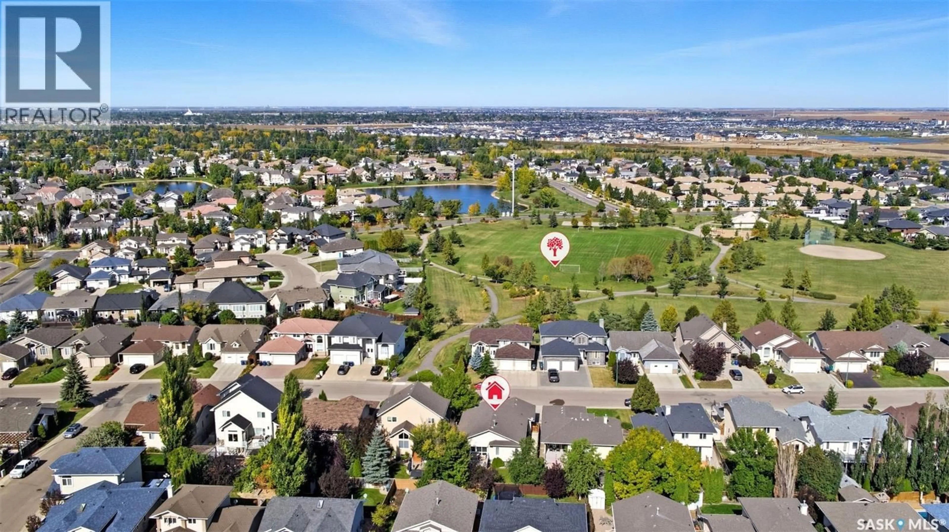 A pic from outside/outdoor area/front of a property/back of a property/a pic from drone, water/lake/river/ocean view for 219 BROOKHURST CRESCENT, Saskatoon Saskatchewan S7V1C5