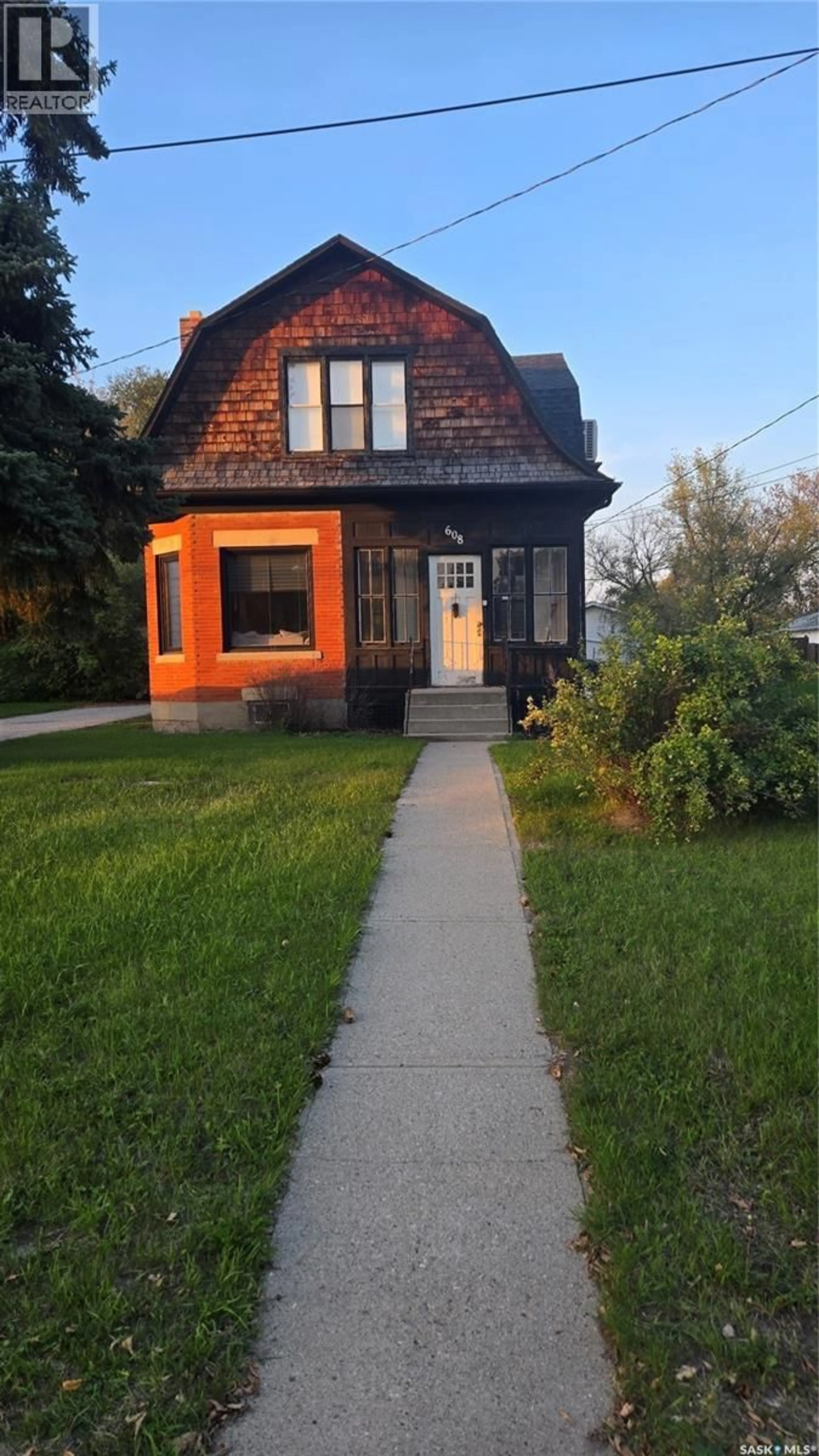 Home with brick exterior material, street for 608 WALSH AVENUE, Oxbow Saskatchewan S0C2B0
