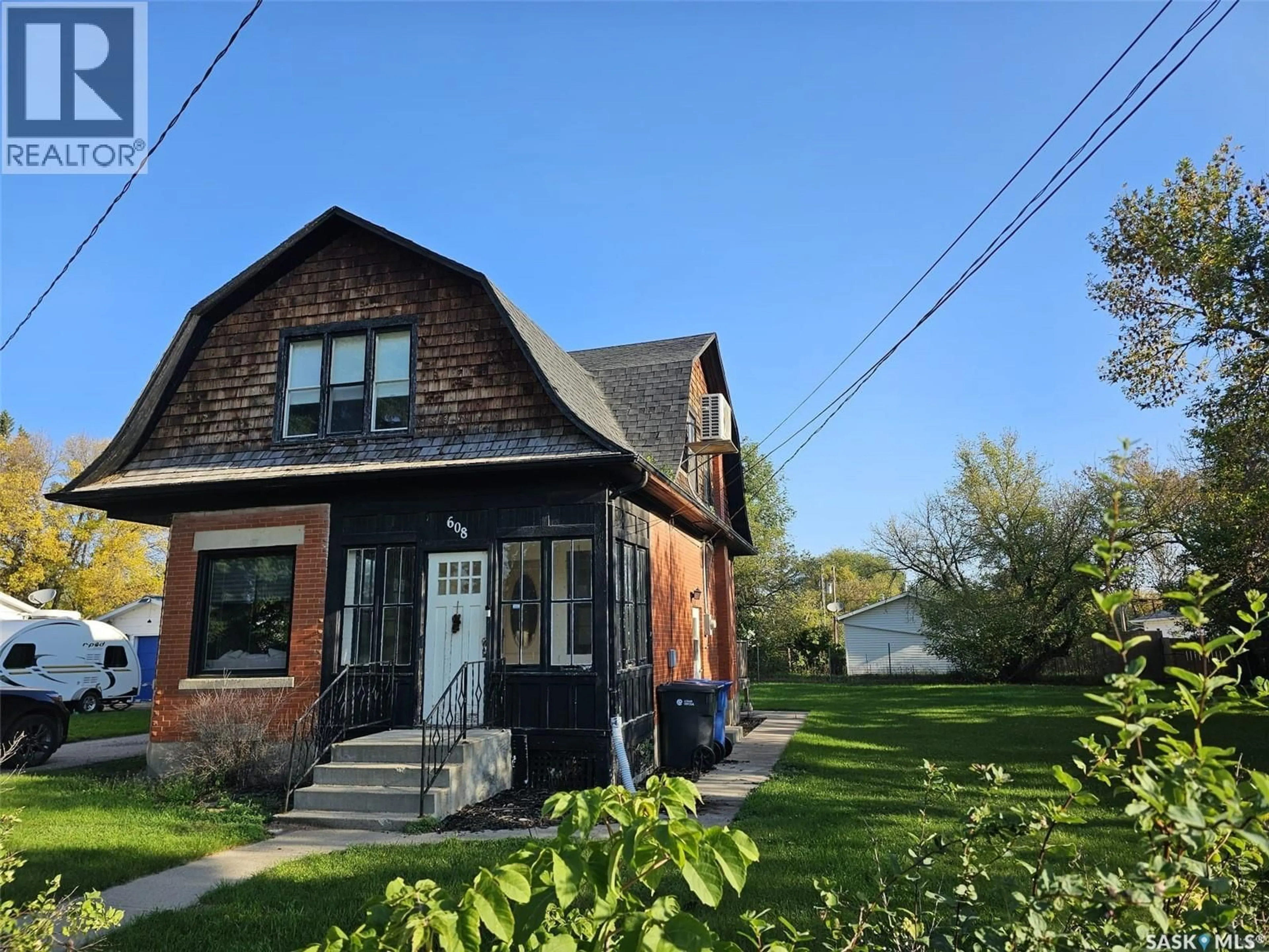 Home with brick exterior material, street for 608 WALSH AVENUE, Oxbow Saskatchewan S0C2B0
